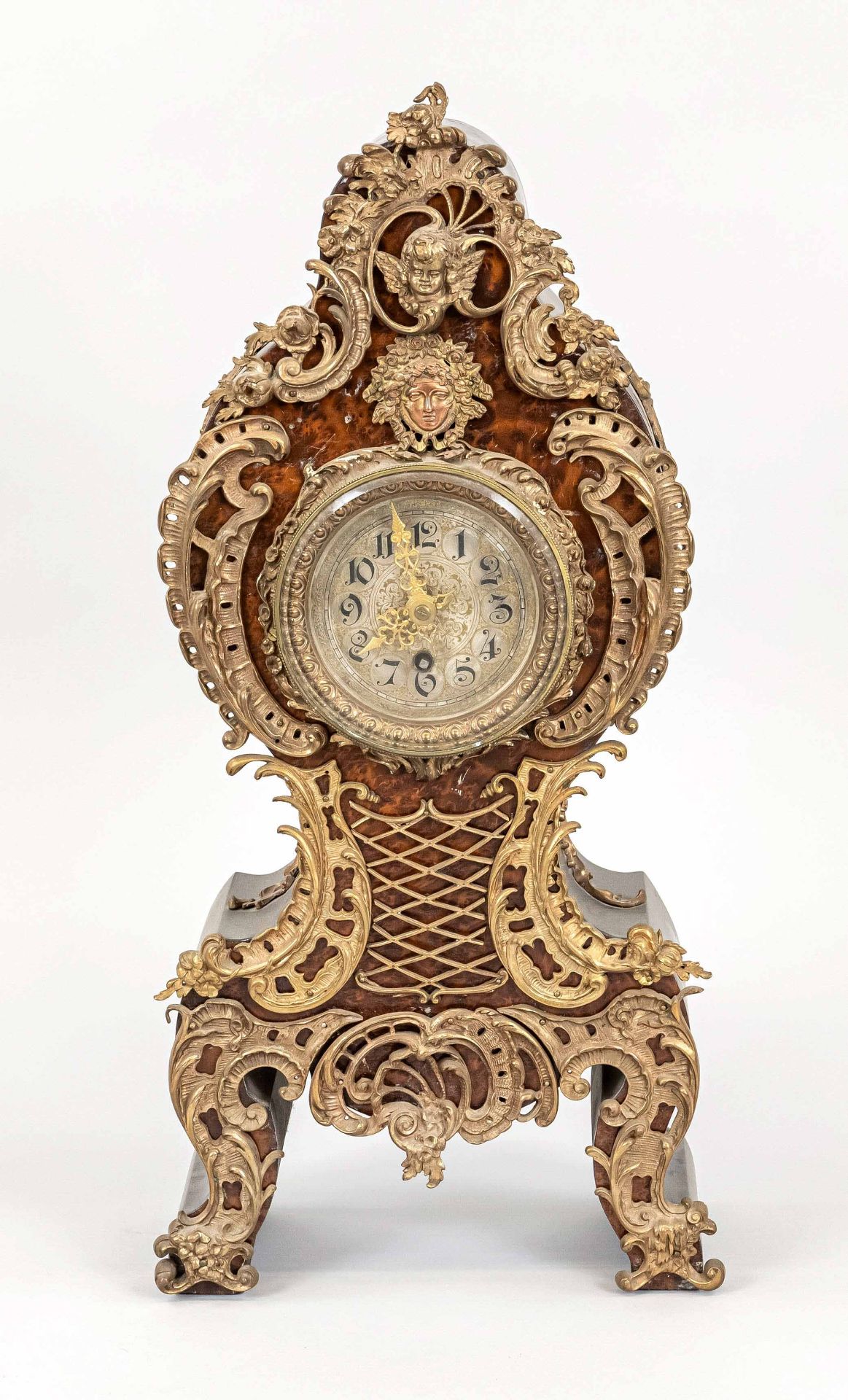 Table clock 2nd half of 19th century, with root wood front, partly ebonized, decorated with gilded