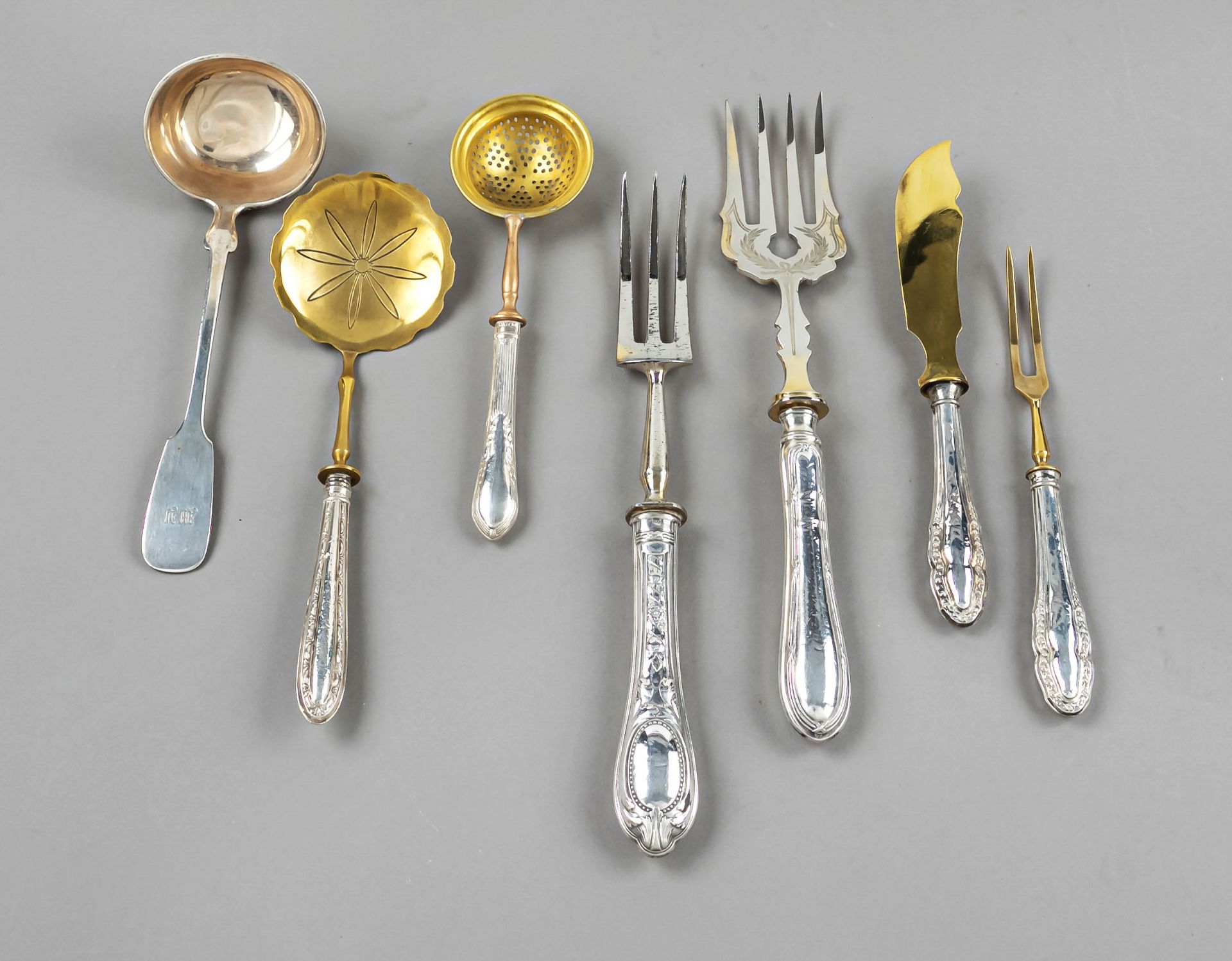 Seven pieces of serving cutlery, 19th/20th century, different makers, silver 750/000 or 800/000,