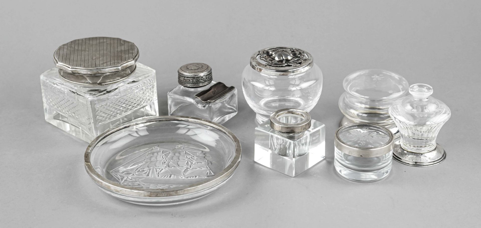 Set of eight pieces with mounting, 20th century, 6x silver of different finenesses, 2x plated,