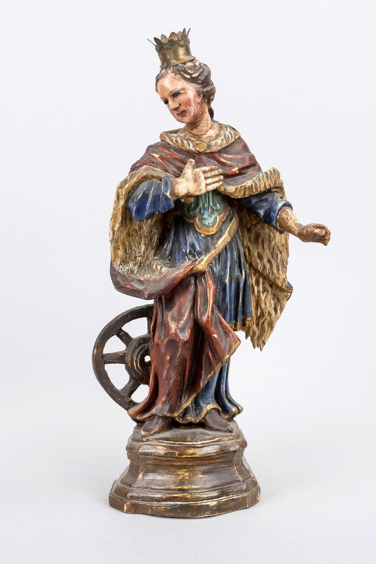 Crowned female figure, probably 19th c., lime wood carving, polychrome painted. Placed on a small