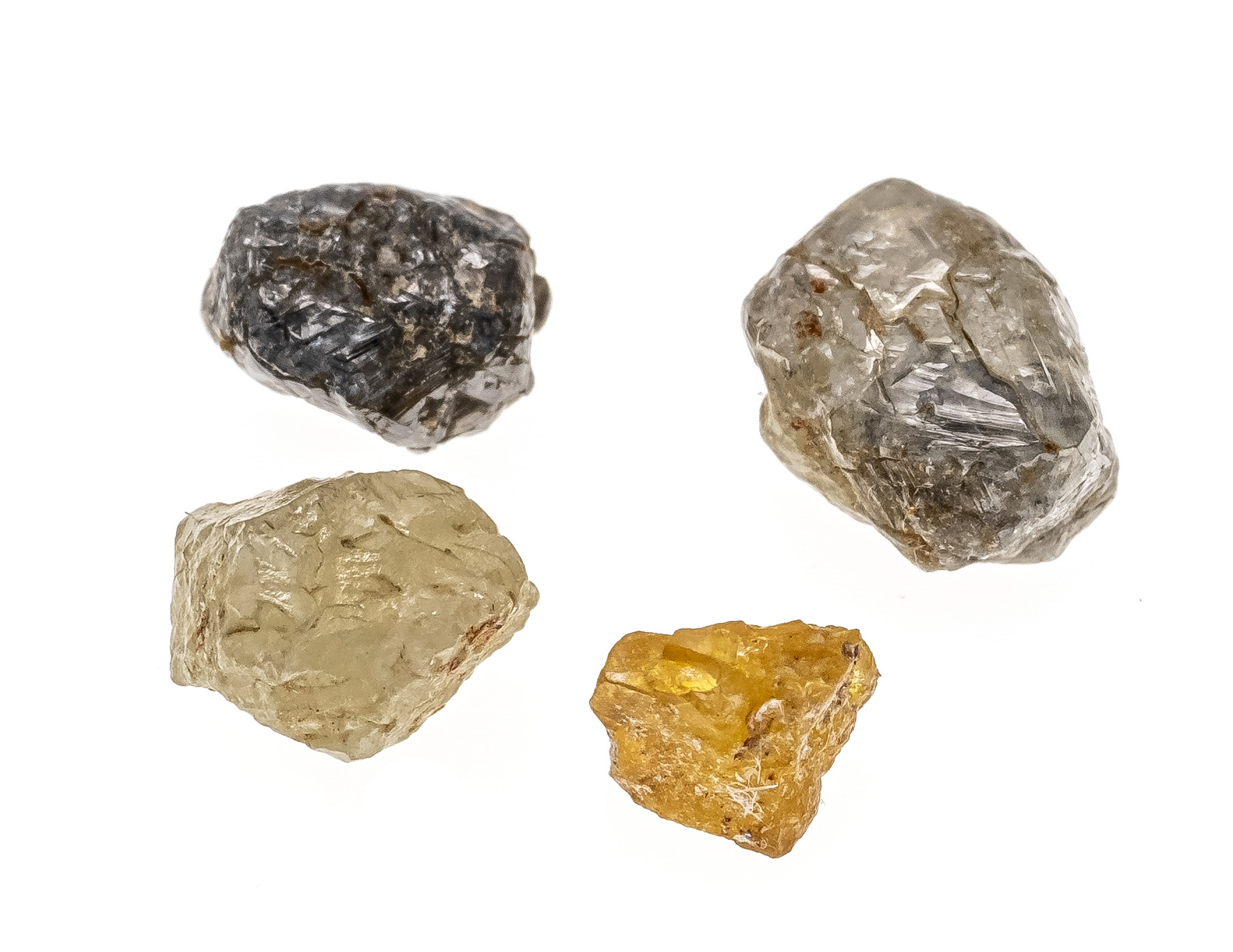 4 rough diamonds, total 4.36 ct toned - anthracite, 7.51 - 4.34 mm