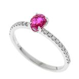 Ruby brilliant ring WG 750/000 with one oval faceted ruby 0,30 ct, pinkish red, transparent with few