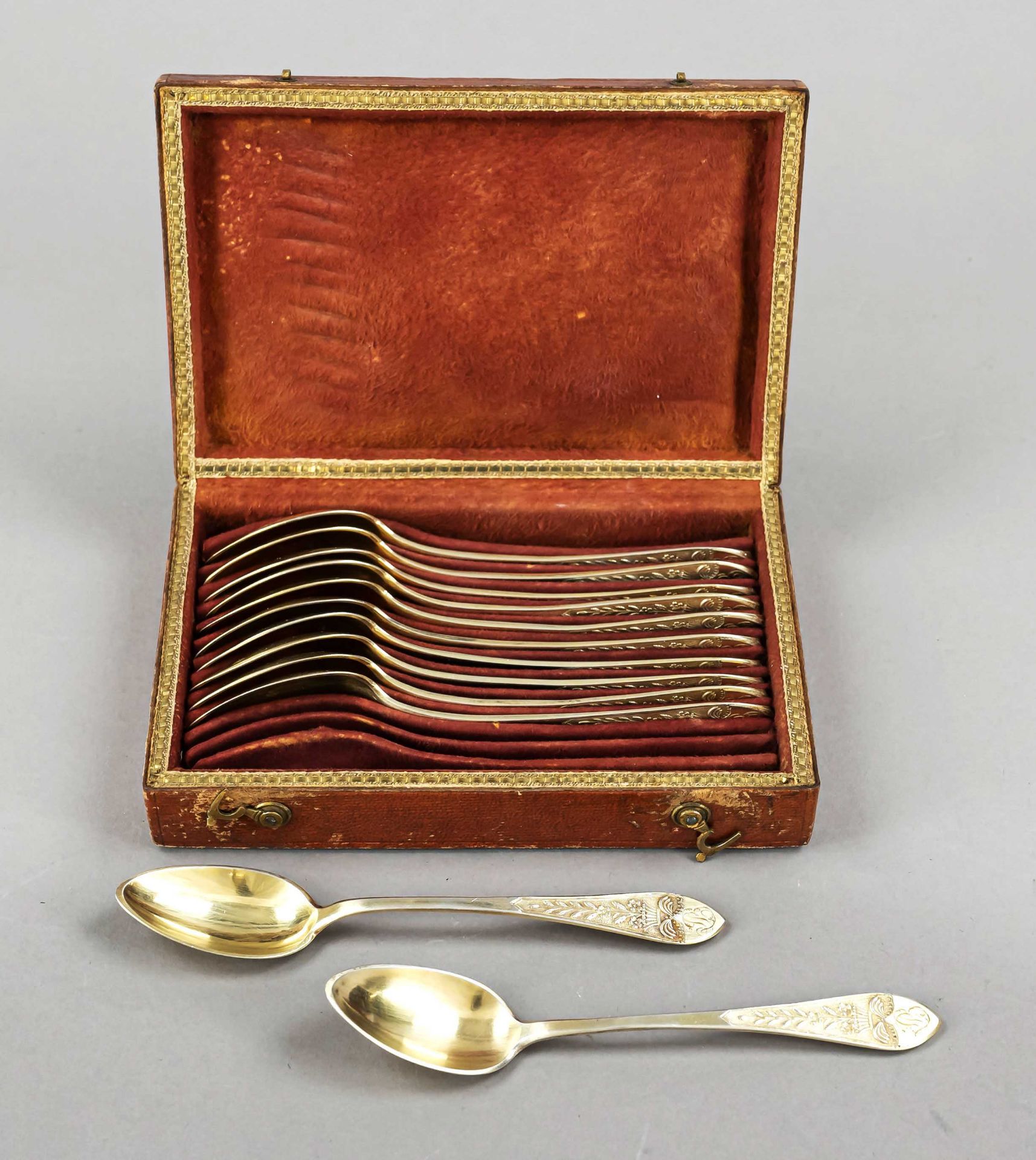 Twelve teaspoons, France, c. 1820, silver 800/000, gilt, tapered handle, with floral relief