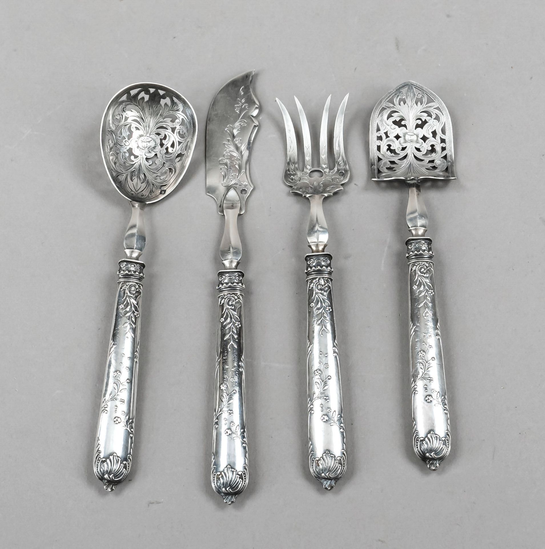 Four serving pieces, France, c. 1900, master mark EH, silver 950/000, filled handles with relief