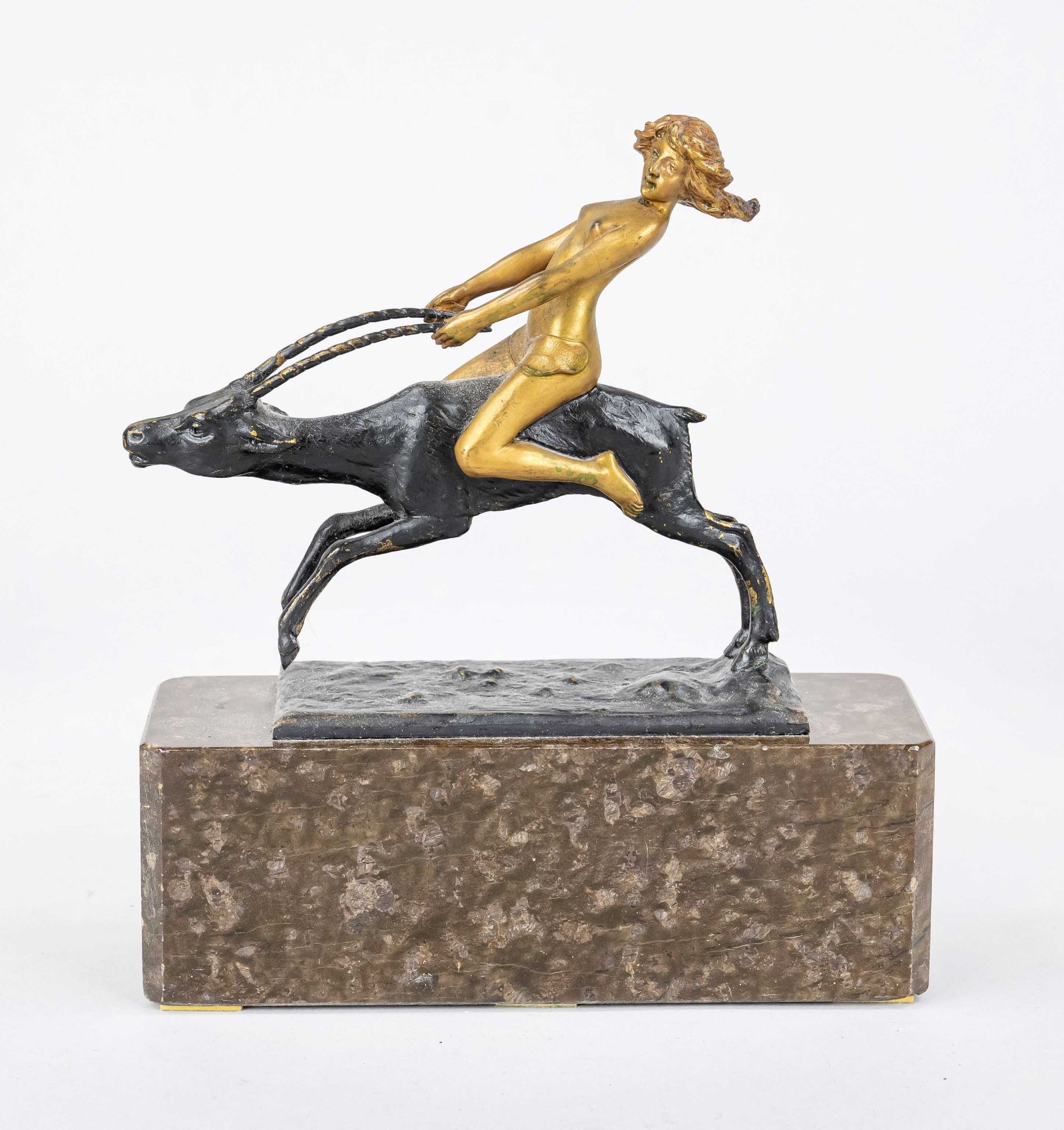 H. Loewenich, sculptor c. 1900, female nude riding an antelope, two-tone patinated bronze on