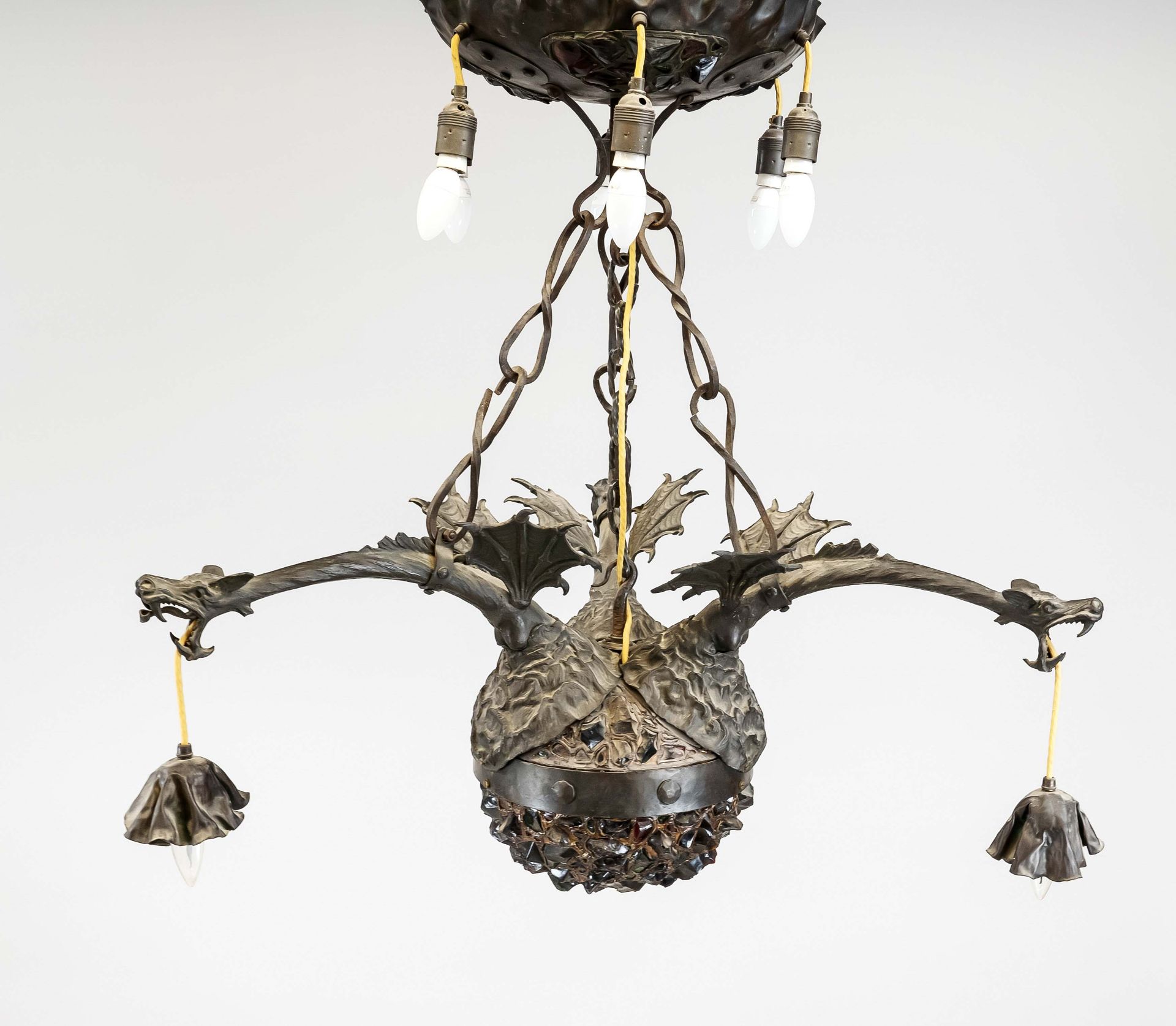Large dragon lamp with humped glass, c. 1900. Large humped glass globe with wide band with rivets.