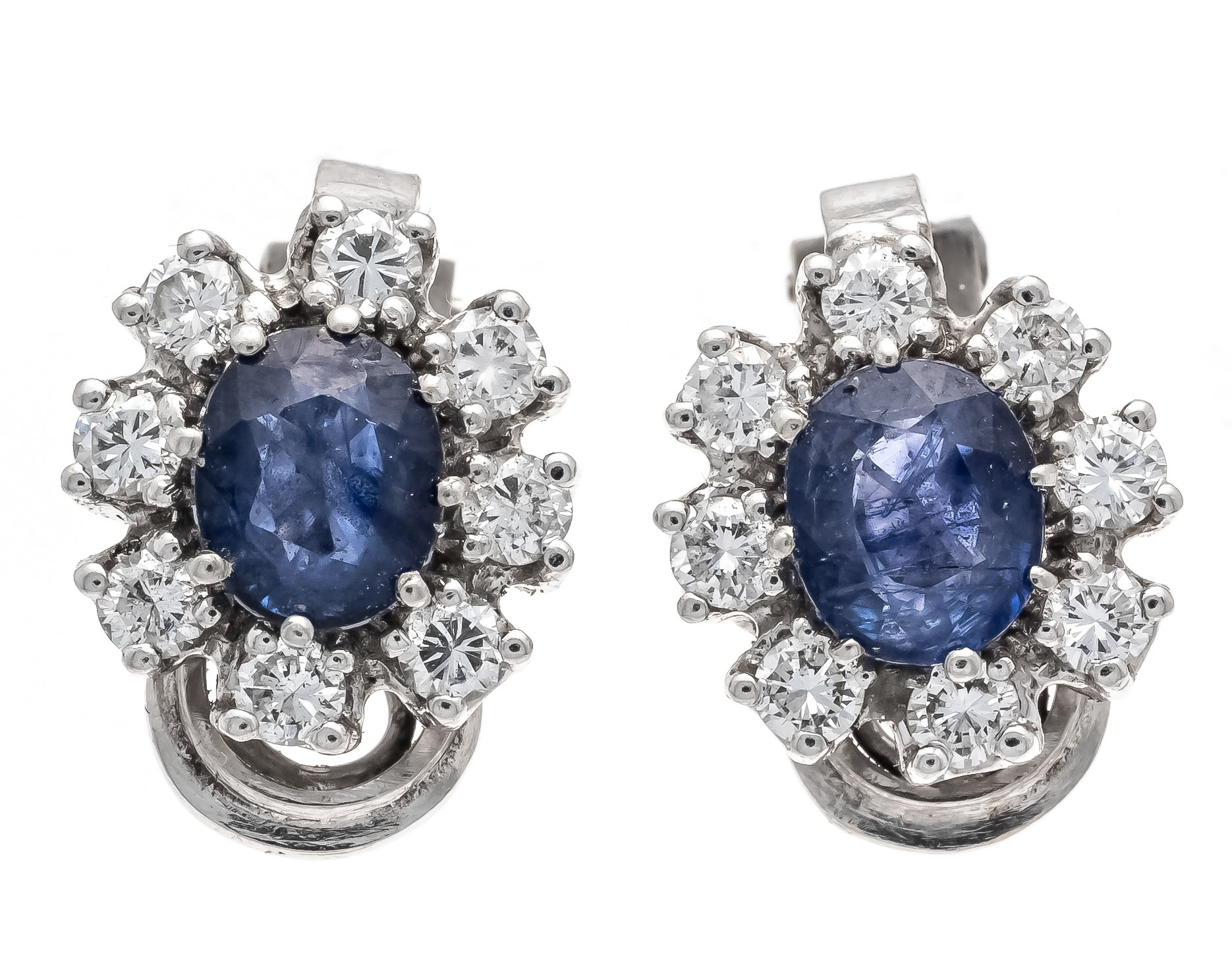 Sapphire diamond earclips WG 585/000 each with a fine oval faceted sapphire 8 x 6 mm and 8