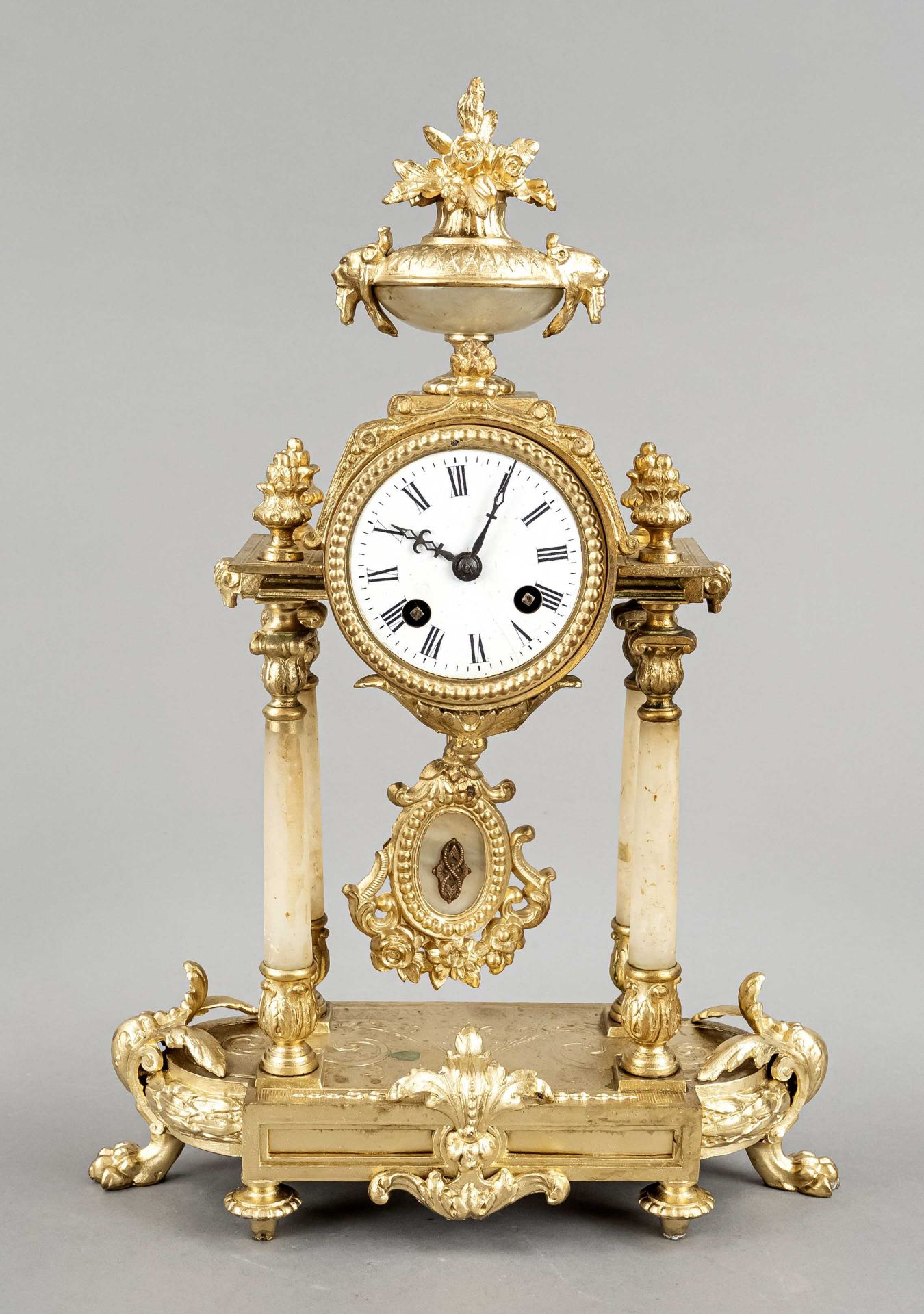 french. Pendulum, 2nd half of the 19th century, color gilded, with 4 alabaster columns, crowned by a