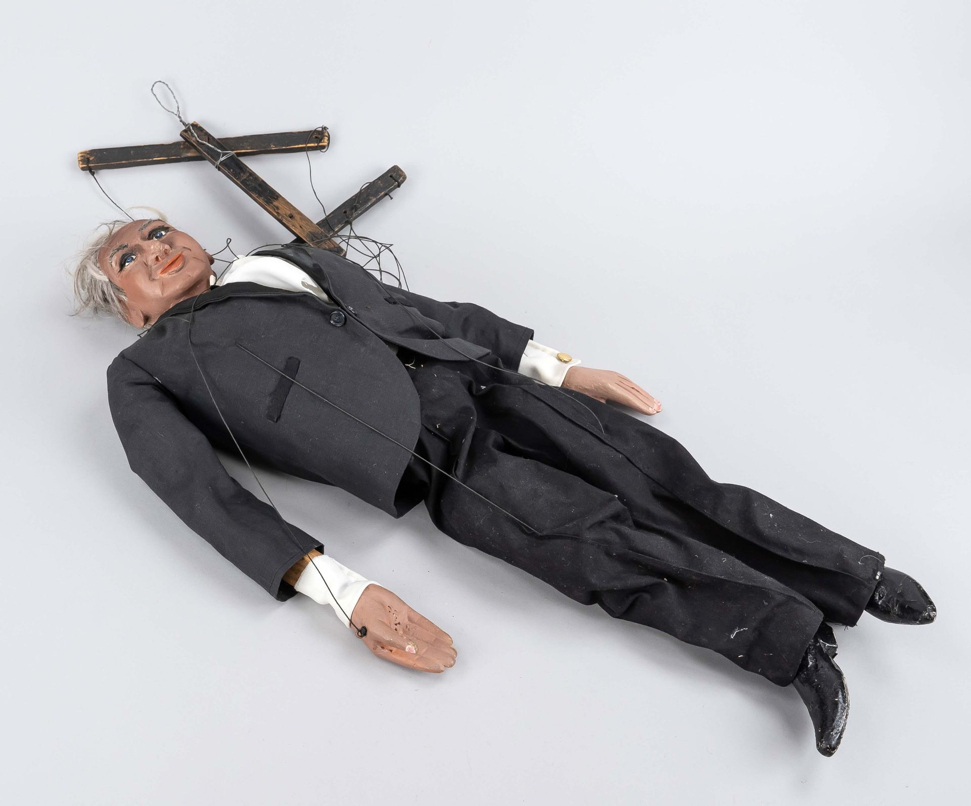 Marionette, 1st half of 20th c., man with gray hair in a suit, slightly rubbed, h. ca. 70 cm