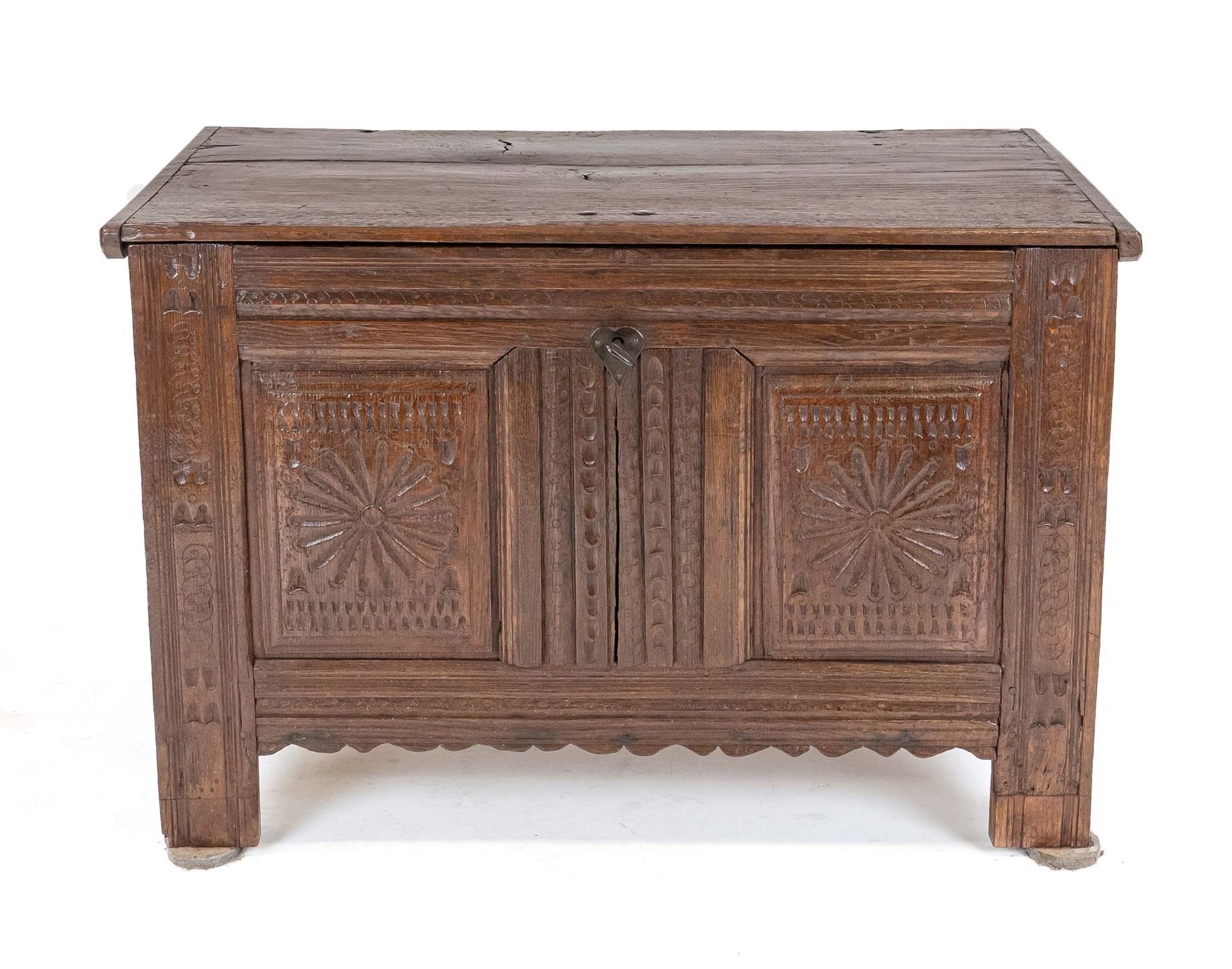 Baroque flat-lidded chest, 18th century, solid oak, coffered sides, two carved fillings on the