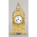 Table clock made of brass in the style of historicism, 2nd half of the 19th century, decorated