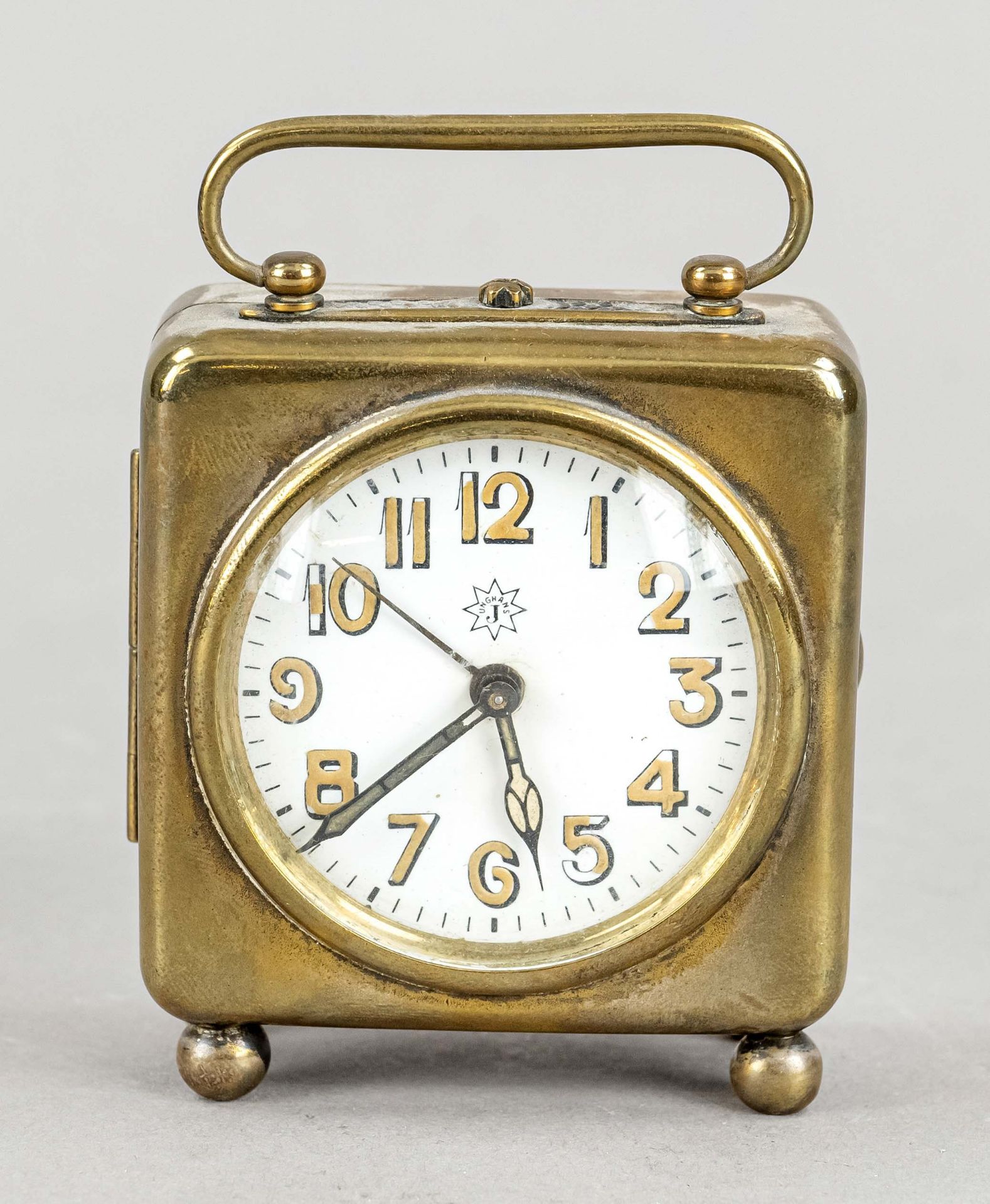 Junghans travel alarm clock, around 1920, brass colored, white enamel dial with arab. luminous