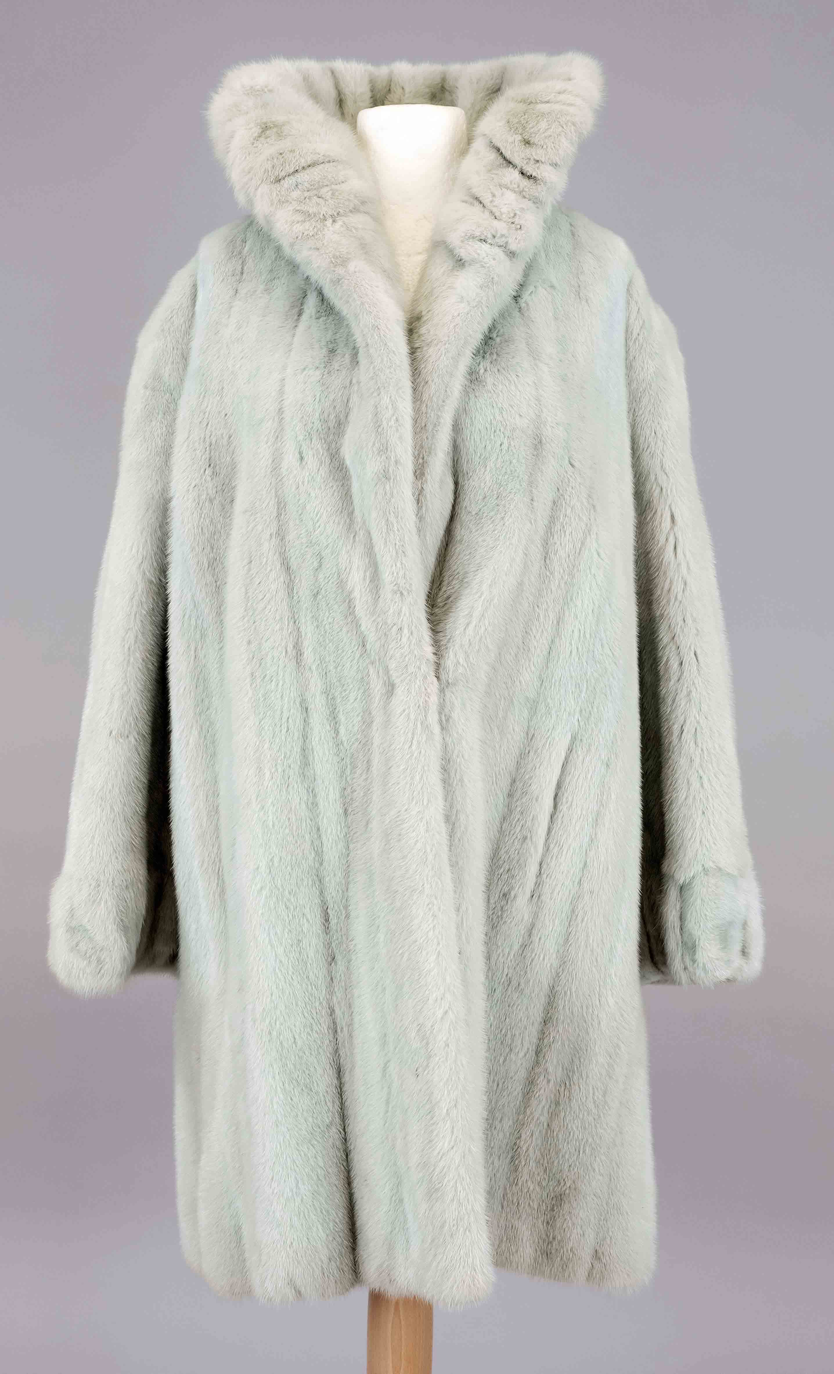 Ladies coat, 2nd half 20th century, mint green dyed mink, shawl collar, closure by hidden fur hooks,