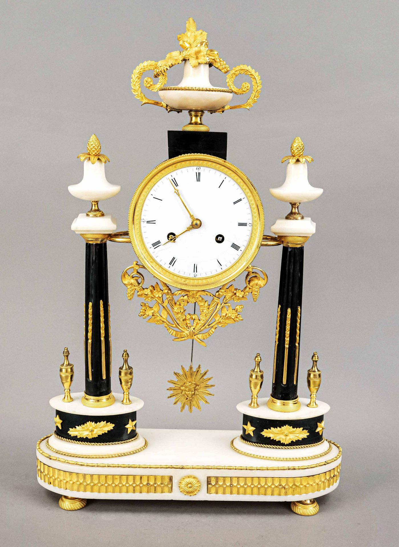 Marble pillar pendulum, 1st half 19th c., white/black marble, gilded clock drum on 2 grooved