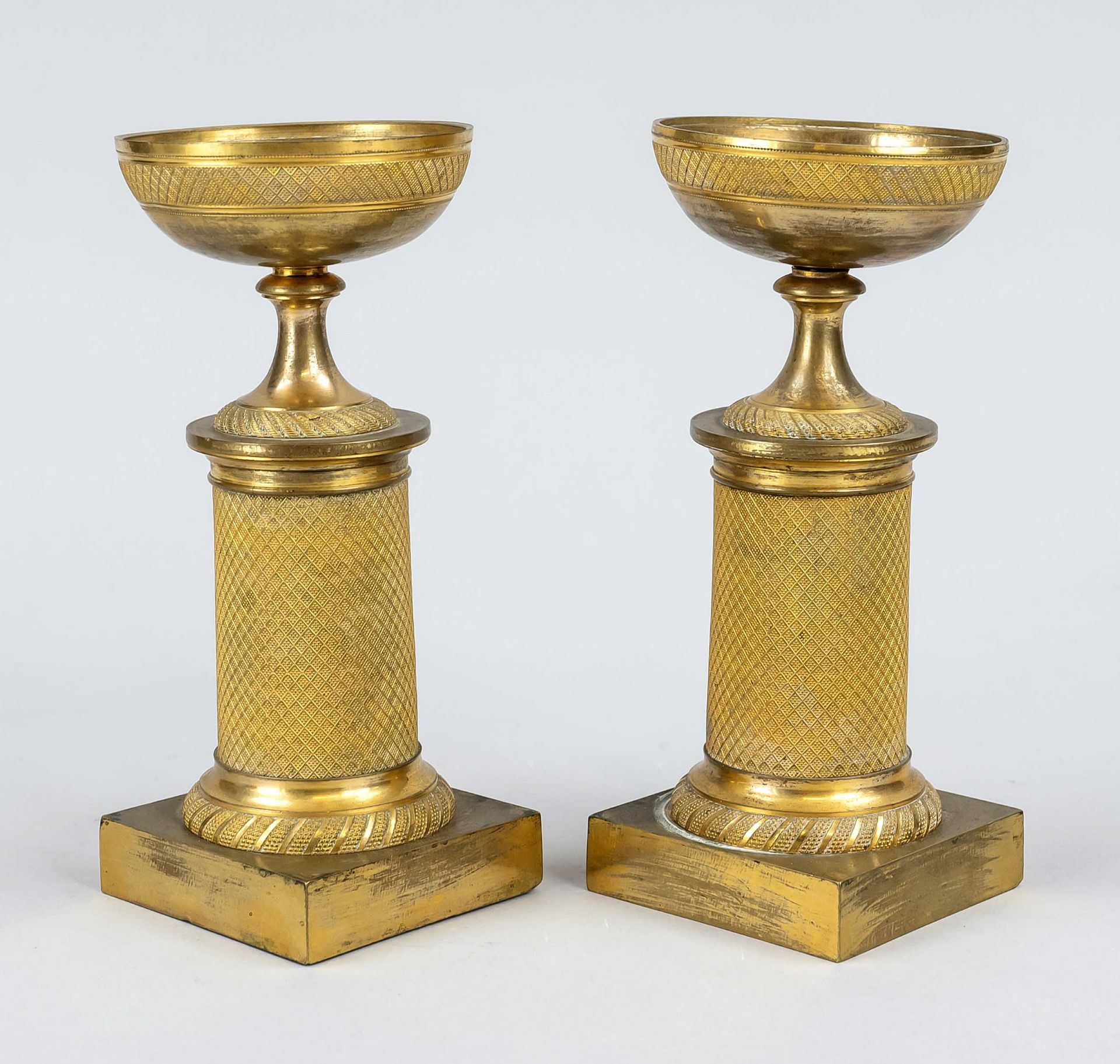 Pair of Empire coupes, France, 1st half of 19th century, fire gilded. Square base, chiselled