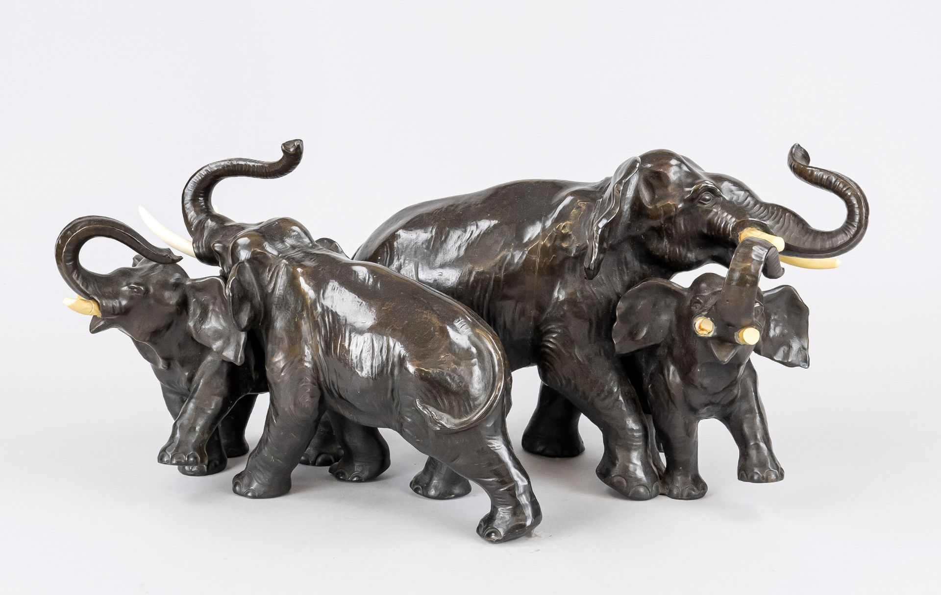 Asian sculptor late 20th c., large elephant group consisting of four animals, patinated metal