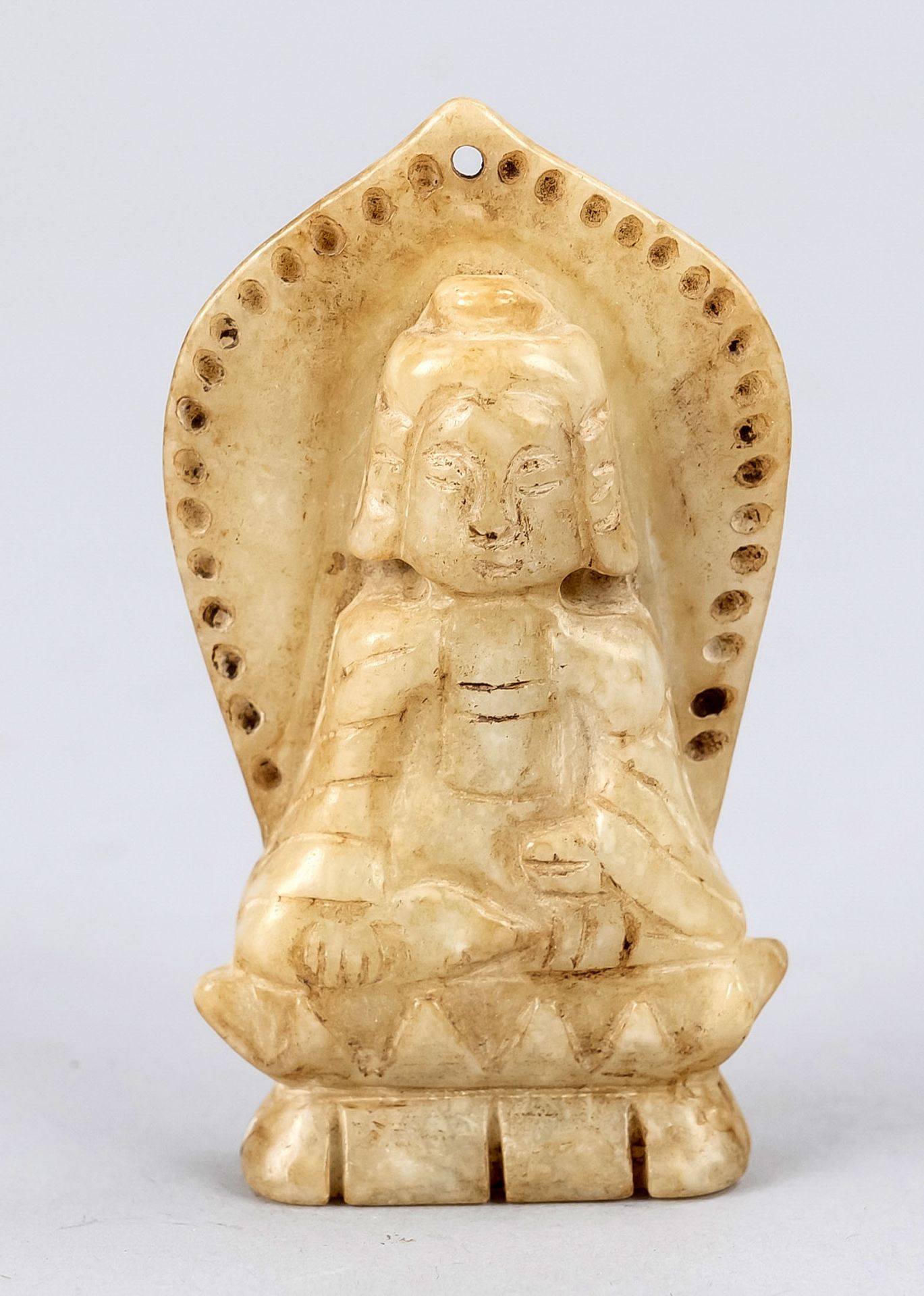 Buddha jade amulet, China, 20th c., jade white mineral carved, Shakyamuni on lotus throne, h 7cm