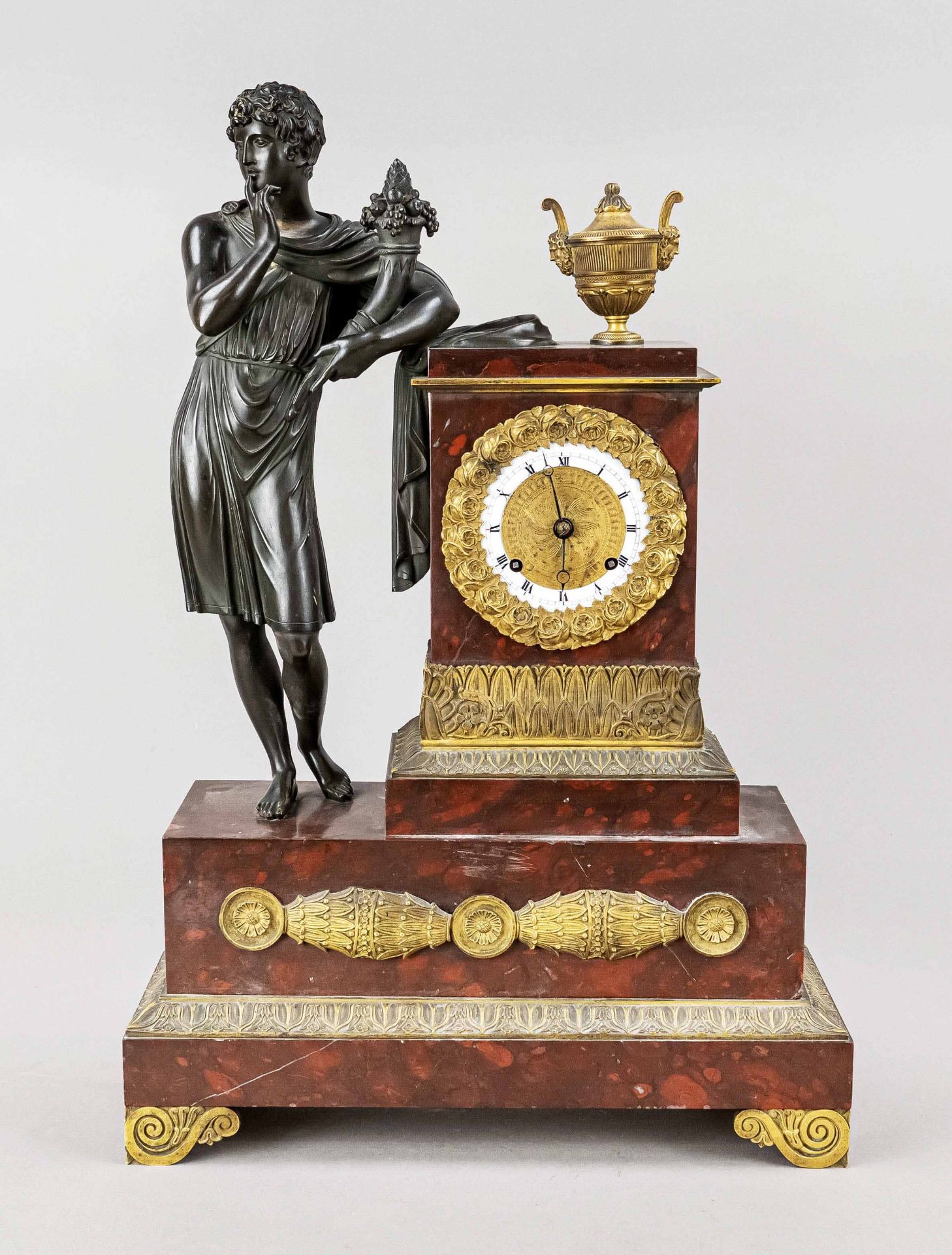 red/brown marble figure pendulum, 1st half 19th c., young man with cornucopia in patinated bronze