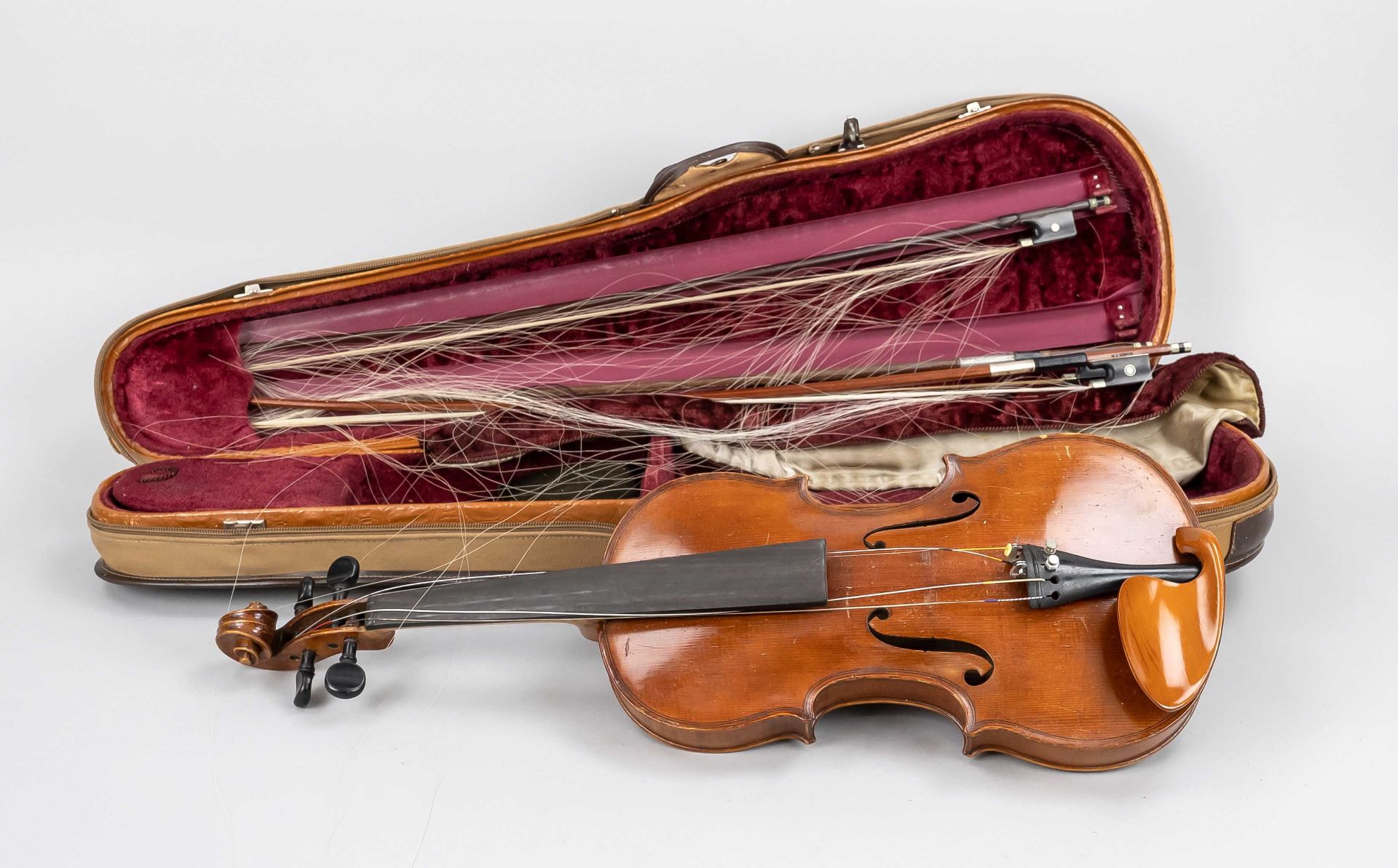 Violin with 3 bows in a case, Germany, probably late 19th c., on a paper label in the body