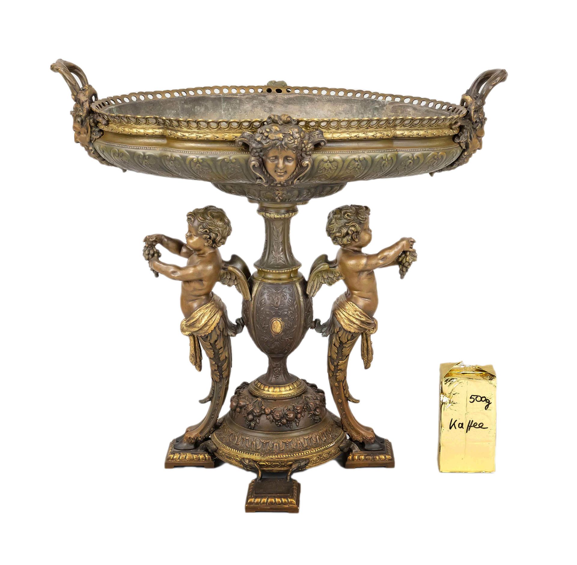 Free-standing state jardiniere, 19th century, four-pass base with satyr putti bacchants around a