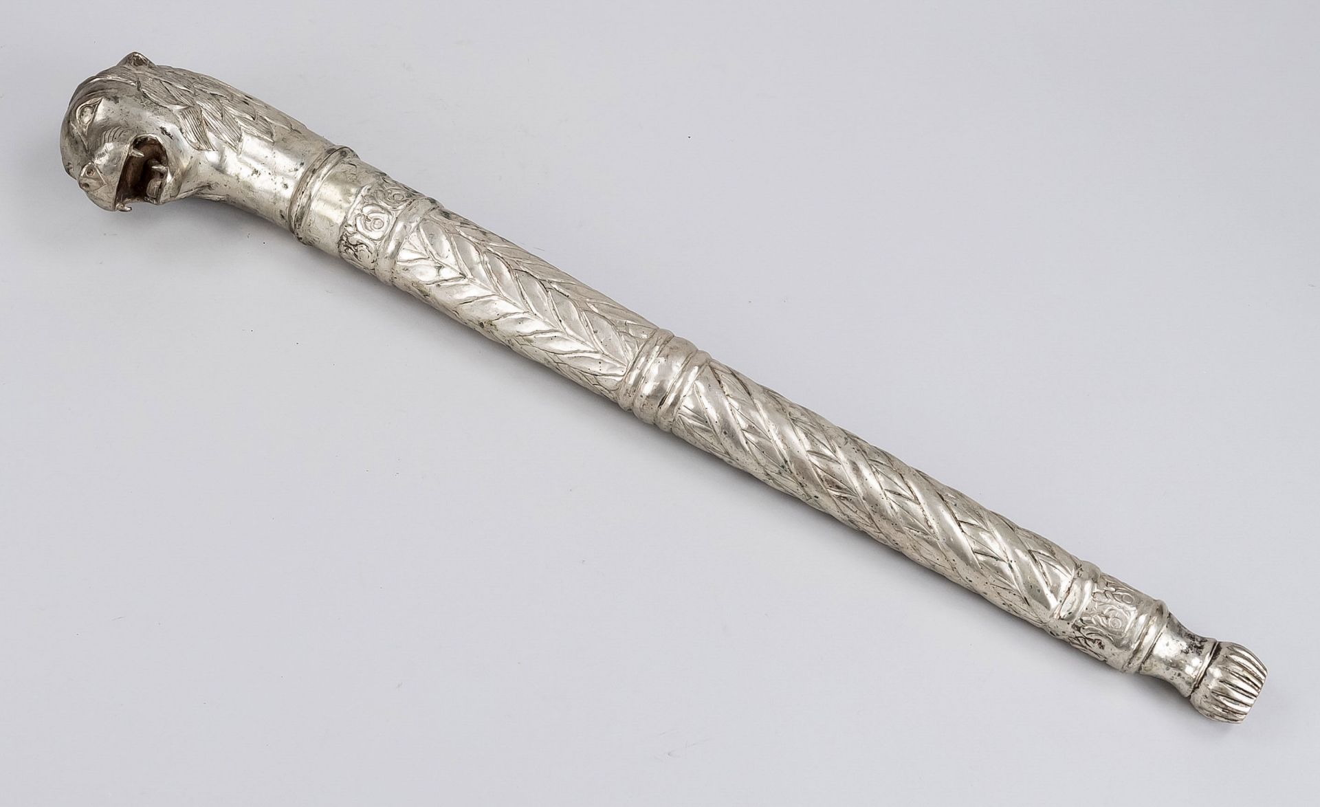 Sacred lion head scepter, India, 20th century, chased white metal, modeled after the silver Maharaja