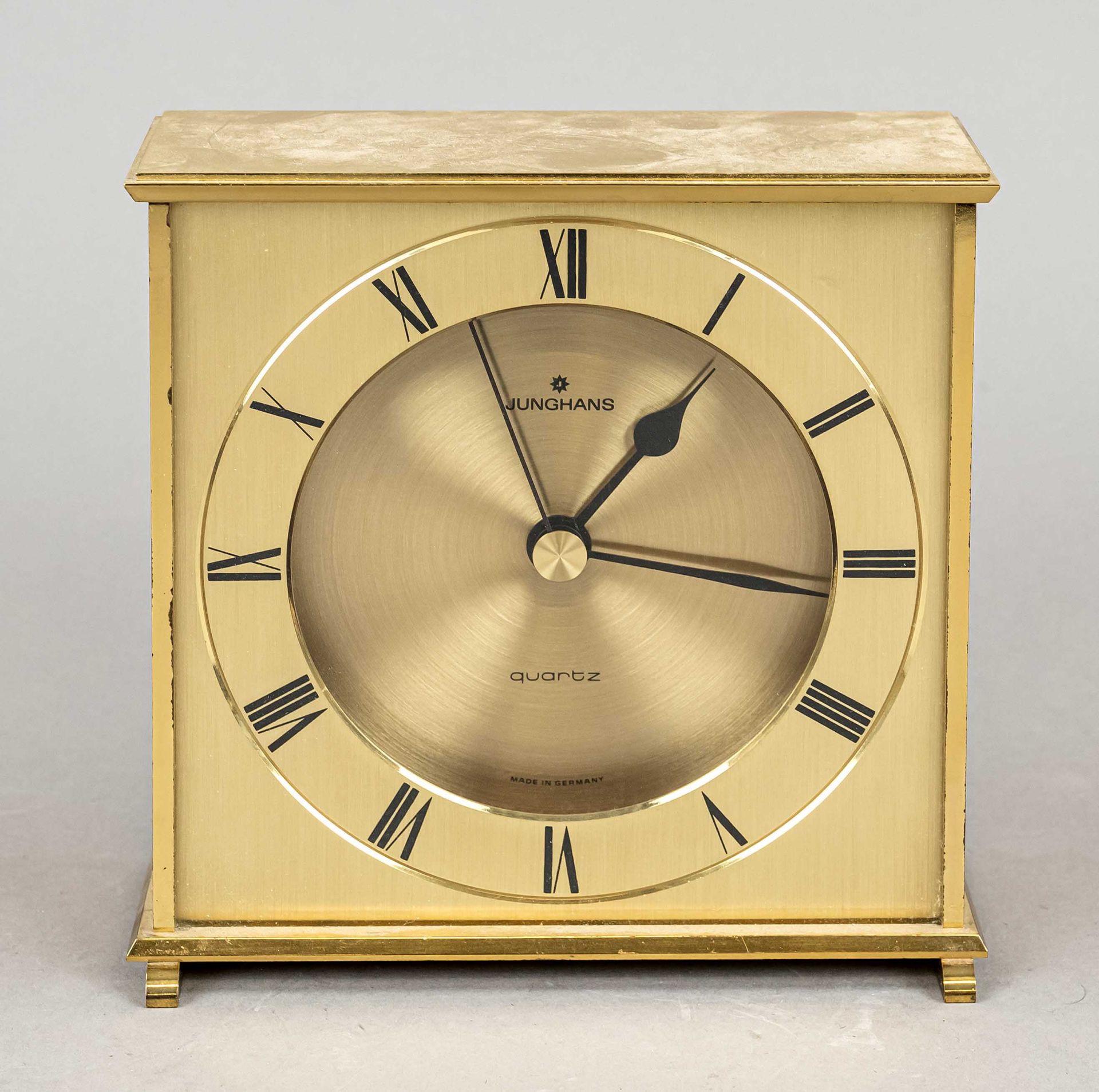 Junghans table clock solid brass, polished and with line cut, around 1990, quartz movement, black