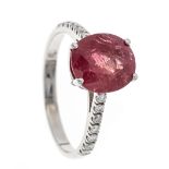 Ruby-brilliant ring WG 750/000 with one oval faceted ruby 9,5 x 8,6 x 5,1 mm, brownish pink-red,