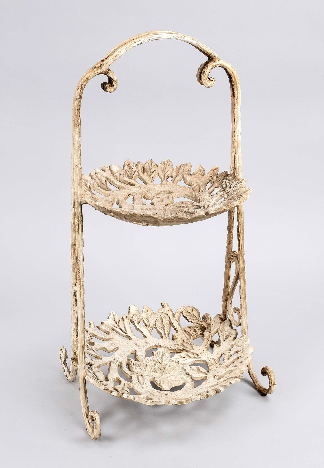 Etagere, 19th c., cast iron, painted white. 2 openwork tiers with oak leaves, on volute feet, bow