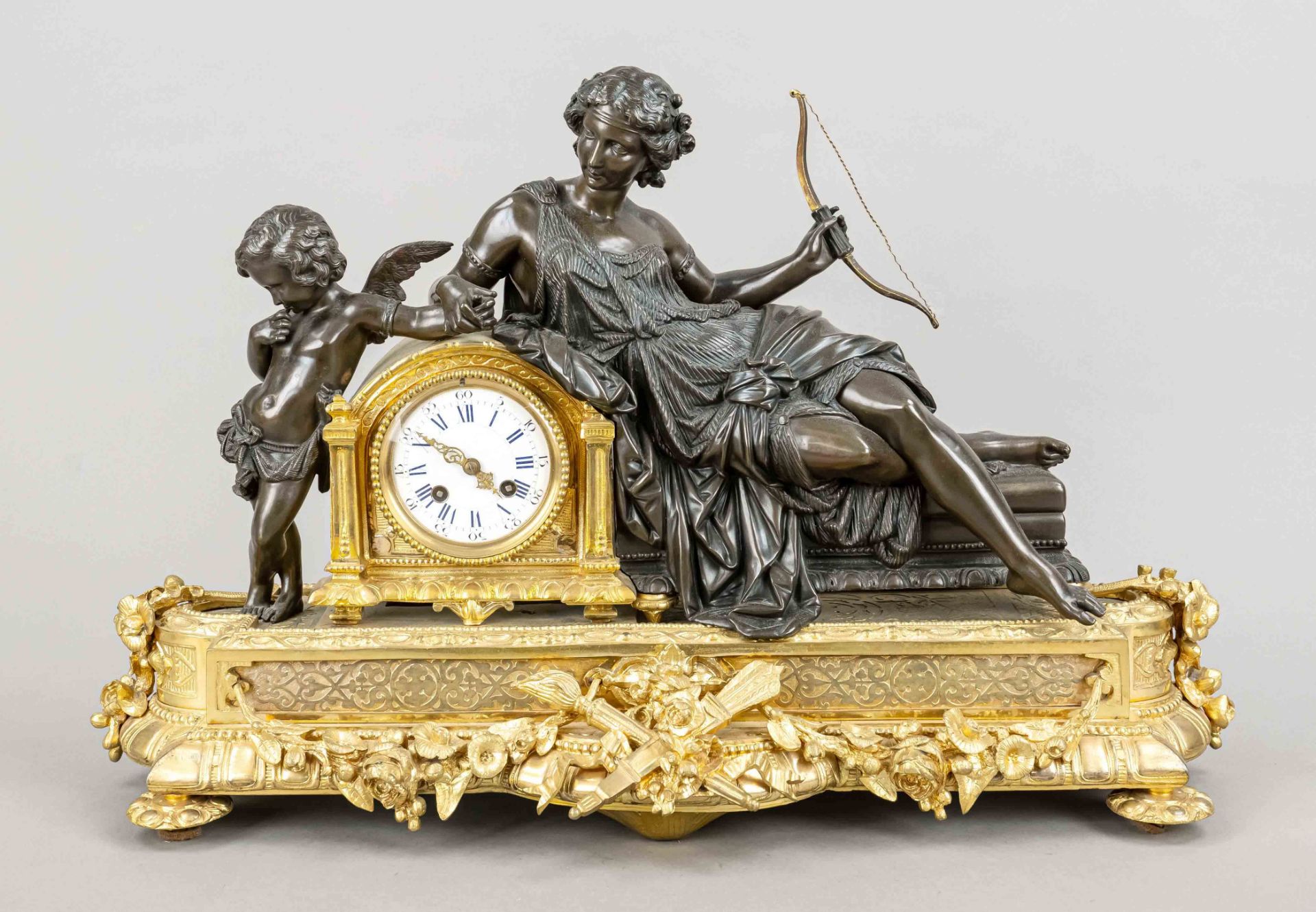 large bronze figural pendulum, 2nd half 19th c., reclining woman has taken away Armor's bow, rich