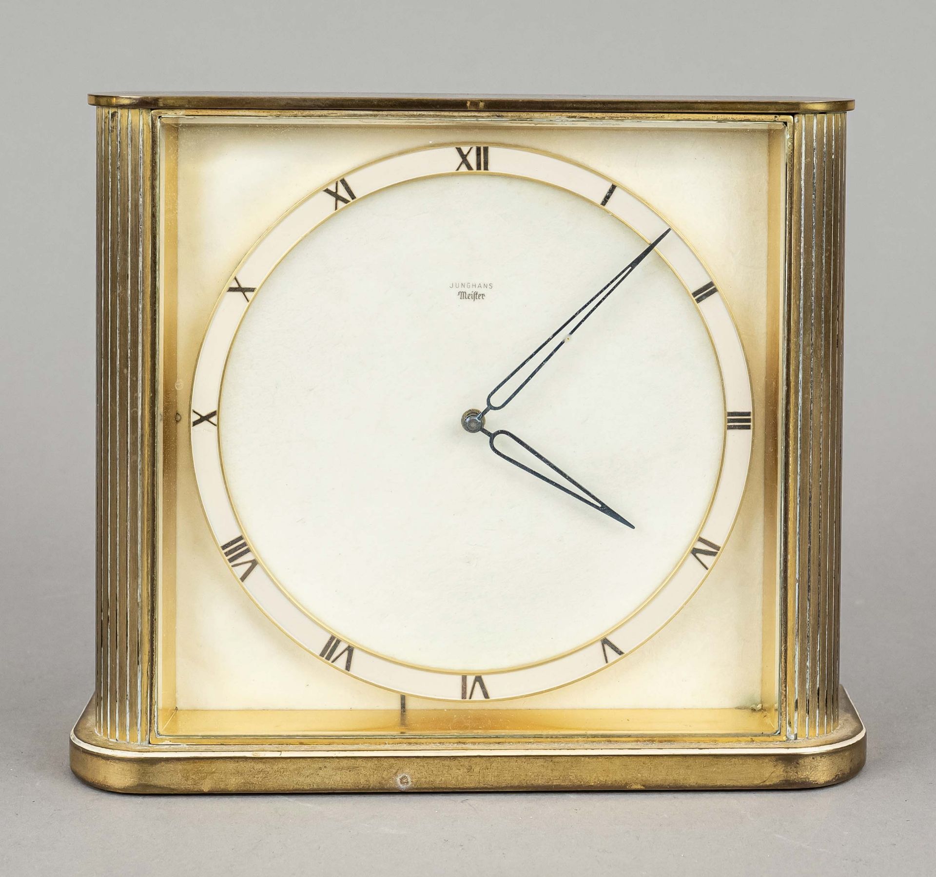 Table clock - Junghans Meister, brass gilded with fluted sides, faceted glass, champagnerf. paper