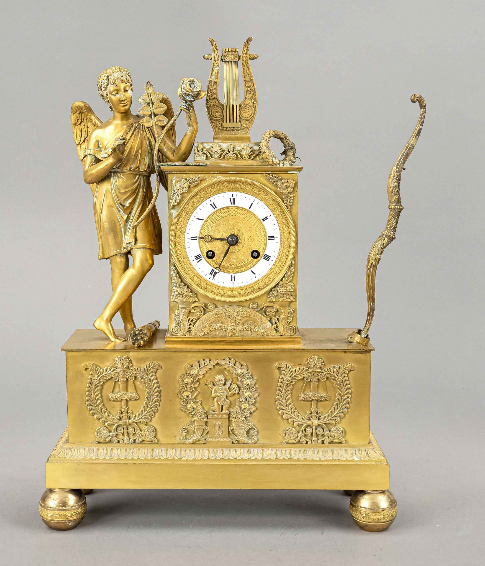Empire Pendulum, France 1st half 19th c., fire gilded bronze, angel with rose on clock block, beside