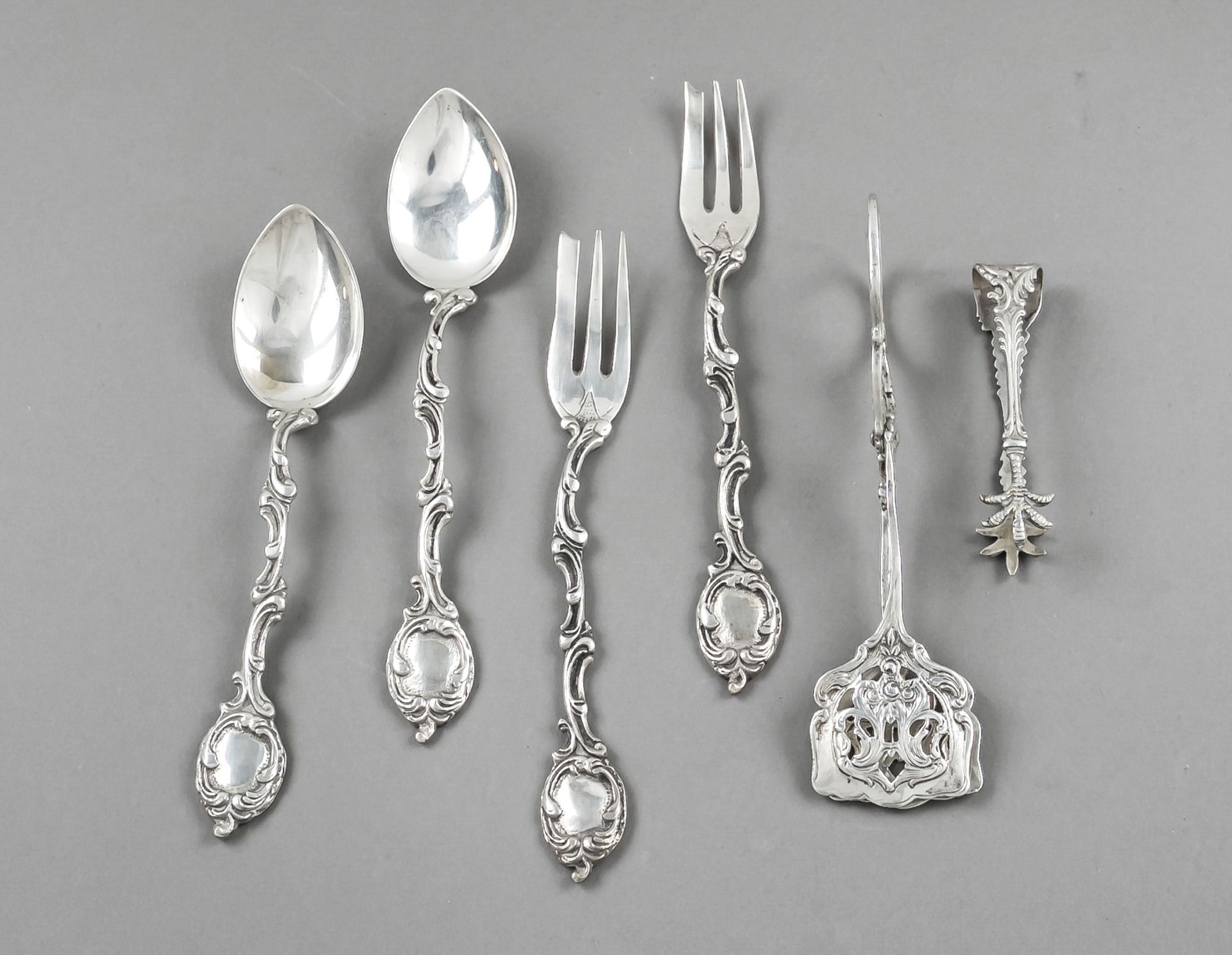 Twelve pieces of cutlery, 20th c., silver 800/000, different decorations, 4 teaspoons, 6 cake forks,