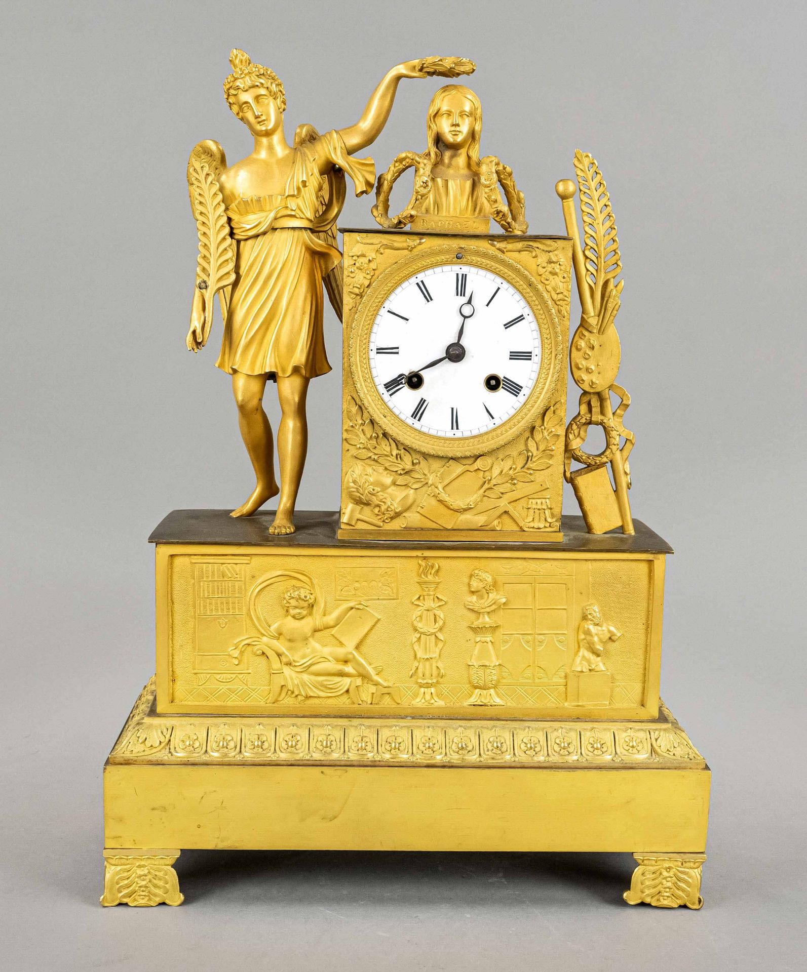 Empire pendulum, 2nd half of 19th century, fire gilded, in the base a putto surrounded by signs of