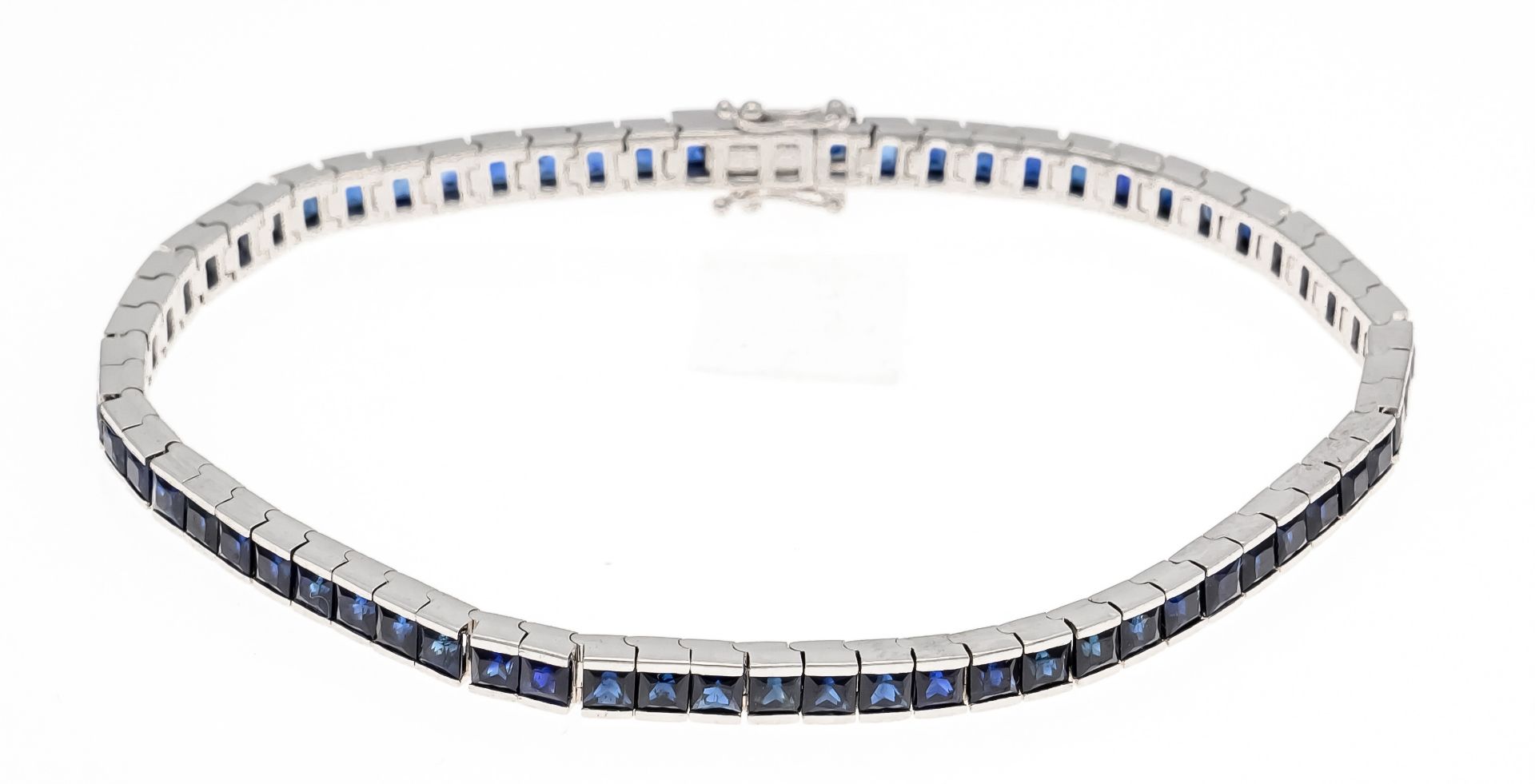 Sapphire riviére bracelet WG 750/000 with 66 faceted sapphire carrées 2.84 mm, add. 8.20 ct darker