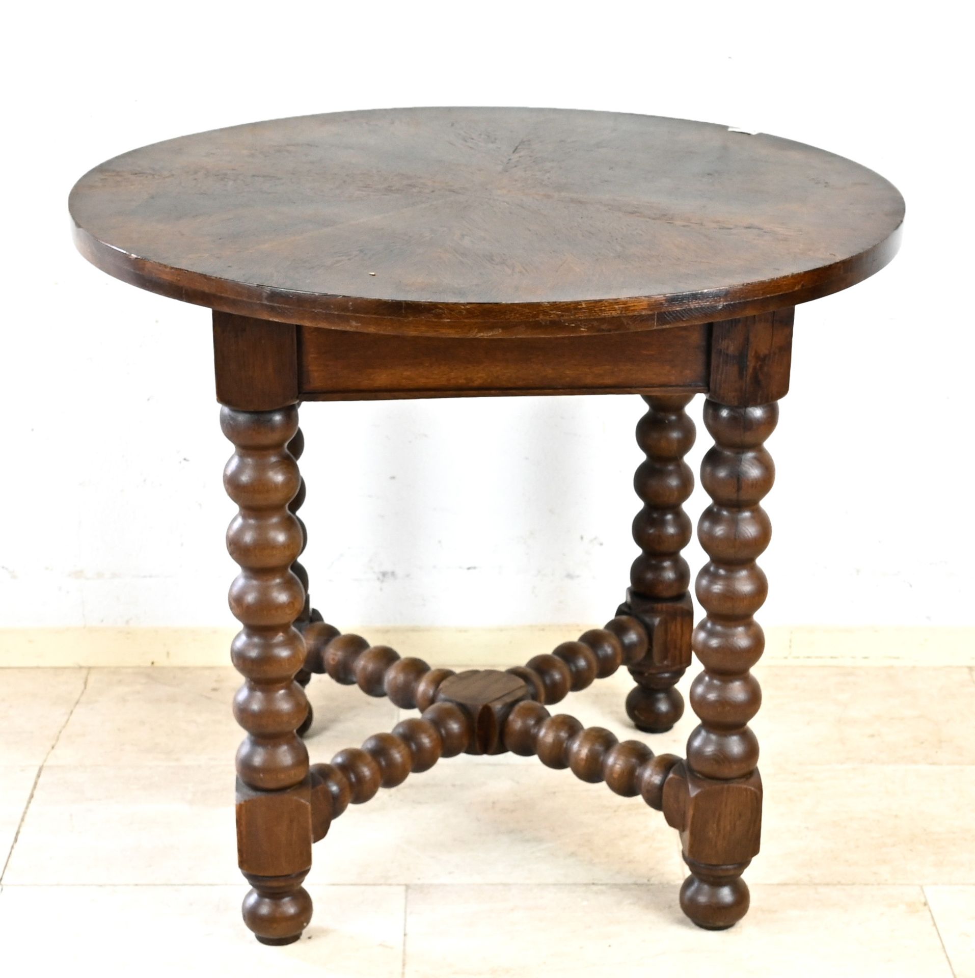 Round table around 1900, solid oak, turned legs, h. 80 cm, d. 90 cm.- The furniture can not be