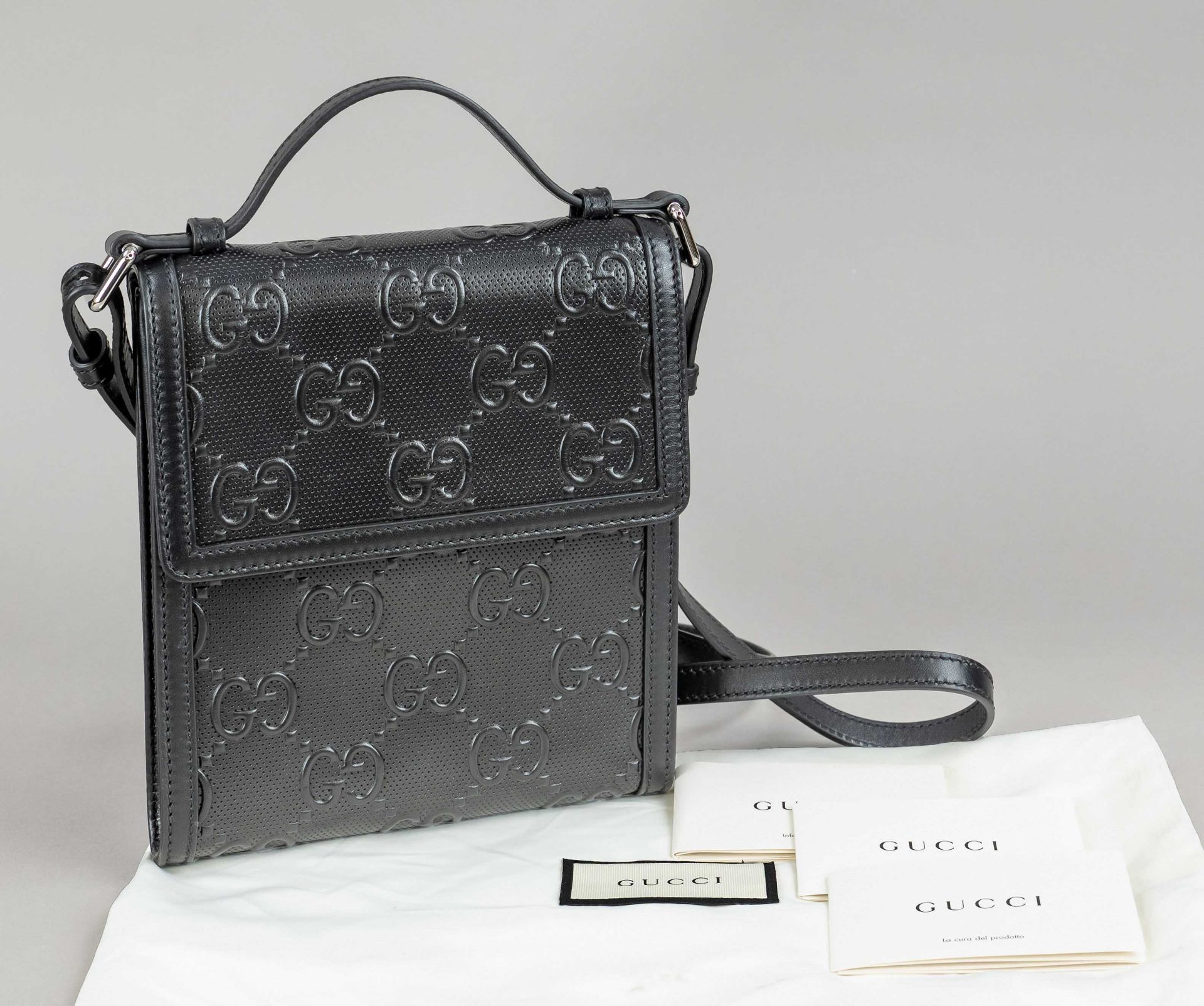 Gucci, GG Embossed Messenger Crossbody Bag, black partial embossed leather with GG Supreme logo in