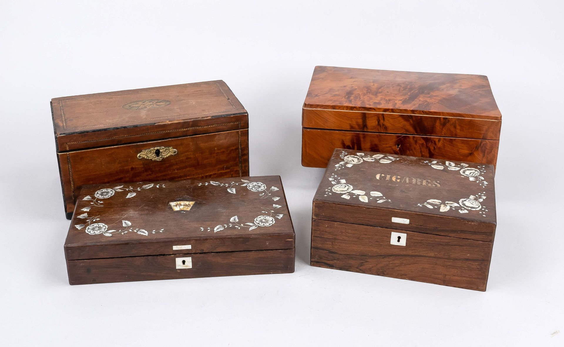 4 cigar boxes/wooden caskets, 19th/20th c., a. mahogany, some with mother-of-pearl inlays. All