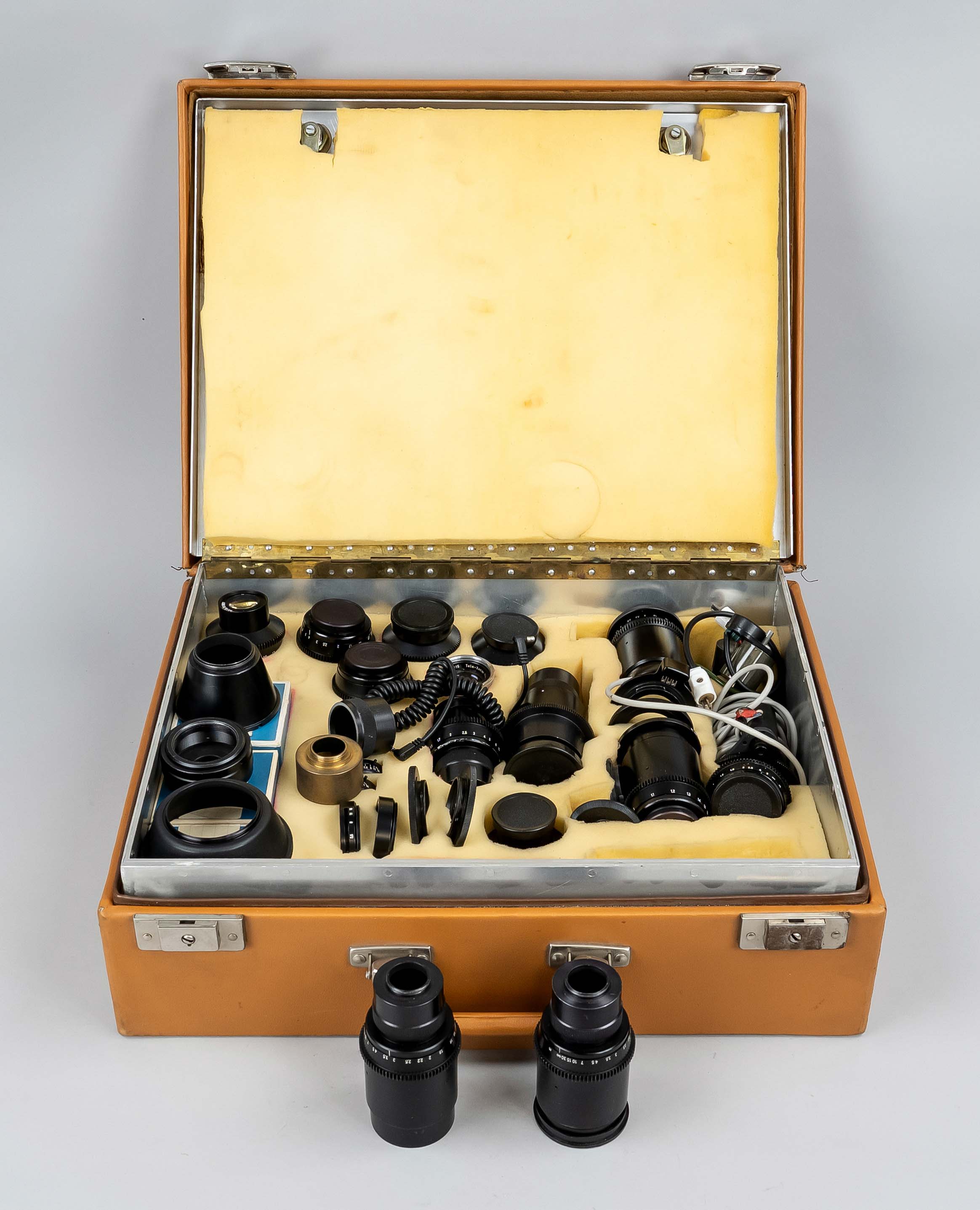 Case with camera equipment, 20th c., without further description, at least 12 lenses and various