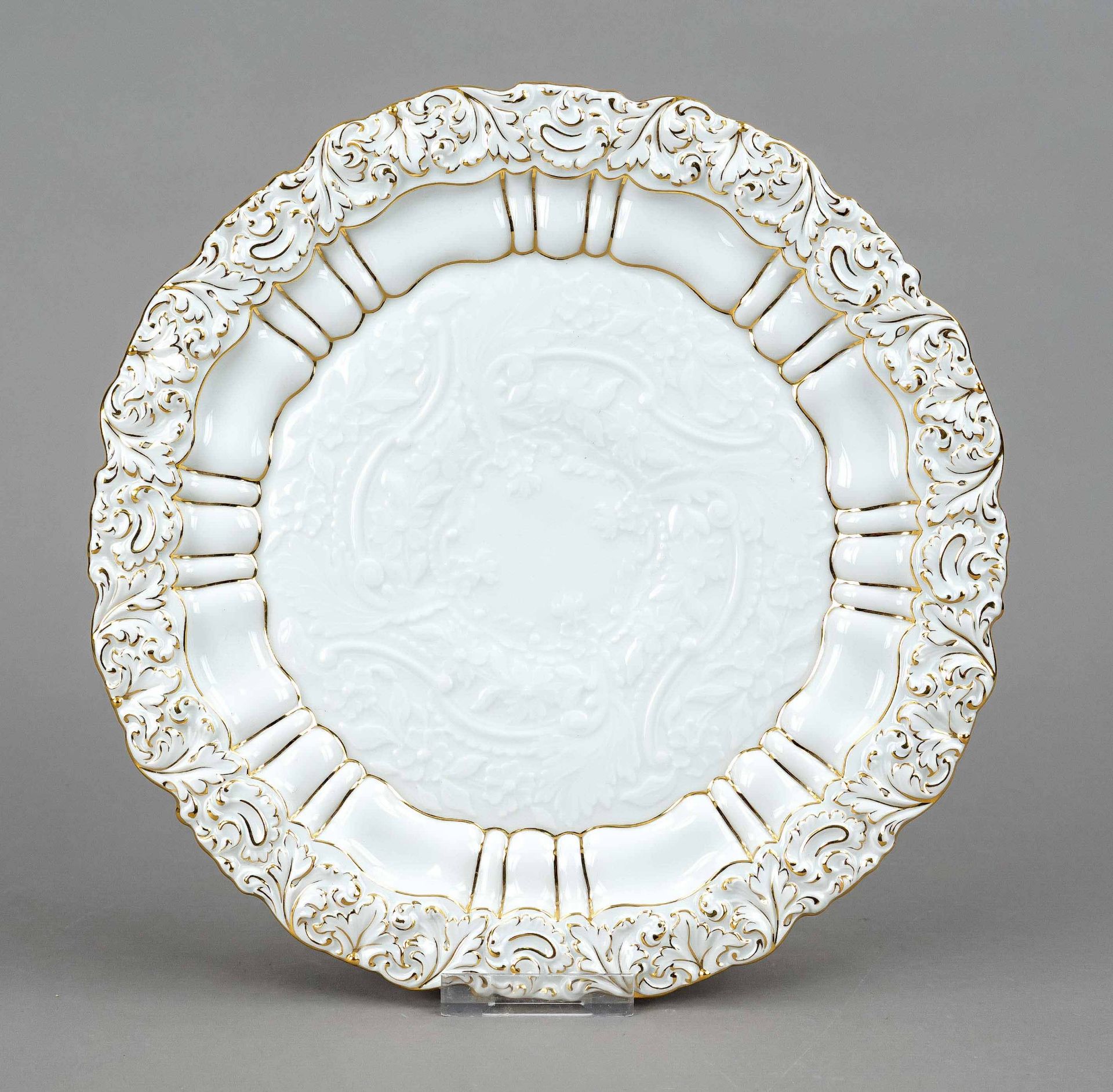 A ceremonial plate, Meissen, 1970s, 1st choice, with rich floral and ornamental relief decor, gold