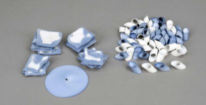 Two boxes with gift items, Pieter Stockmans, born 1940 in Belgium, hard porcelain in white and blue,