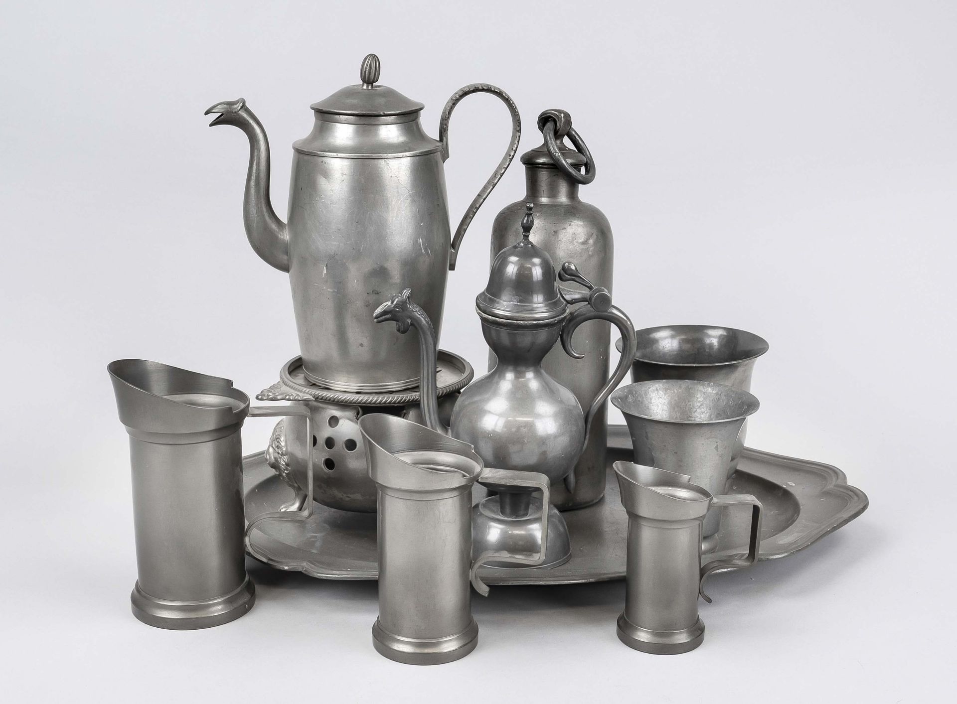 10 pieces of pewter 19th/20th c., consisting of a tray, hot water bottle, a teapot with lion
