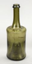 Wine bottle, 18th c., cylindrical body with slender neck, strongly upturned bottom, dark green