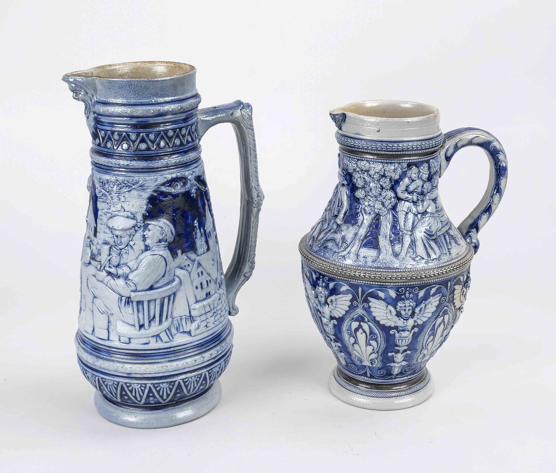 2 Westerwald jugs, Germany, around 1900, stoneware with blue glaze, fig.l decor, h to 32cm
