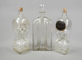 Three brandy bottles, 18th/19th century, gripping bottle and 2x Kuttrolf/Glucker bottle, clear