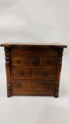 A MINIATURE HARDWOOD MULTI DRAWER CHEST WITH HINGED TOP - WOULD BE IDEAL FOR SEWING ACCESSORIES