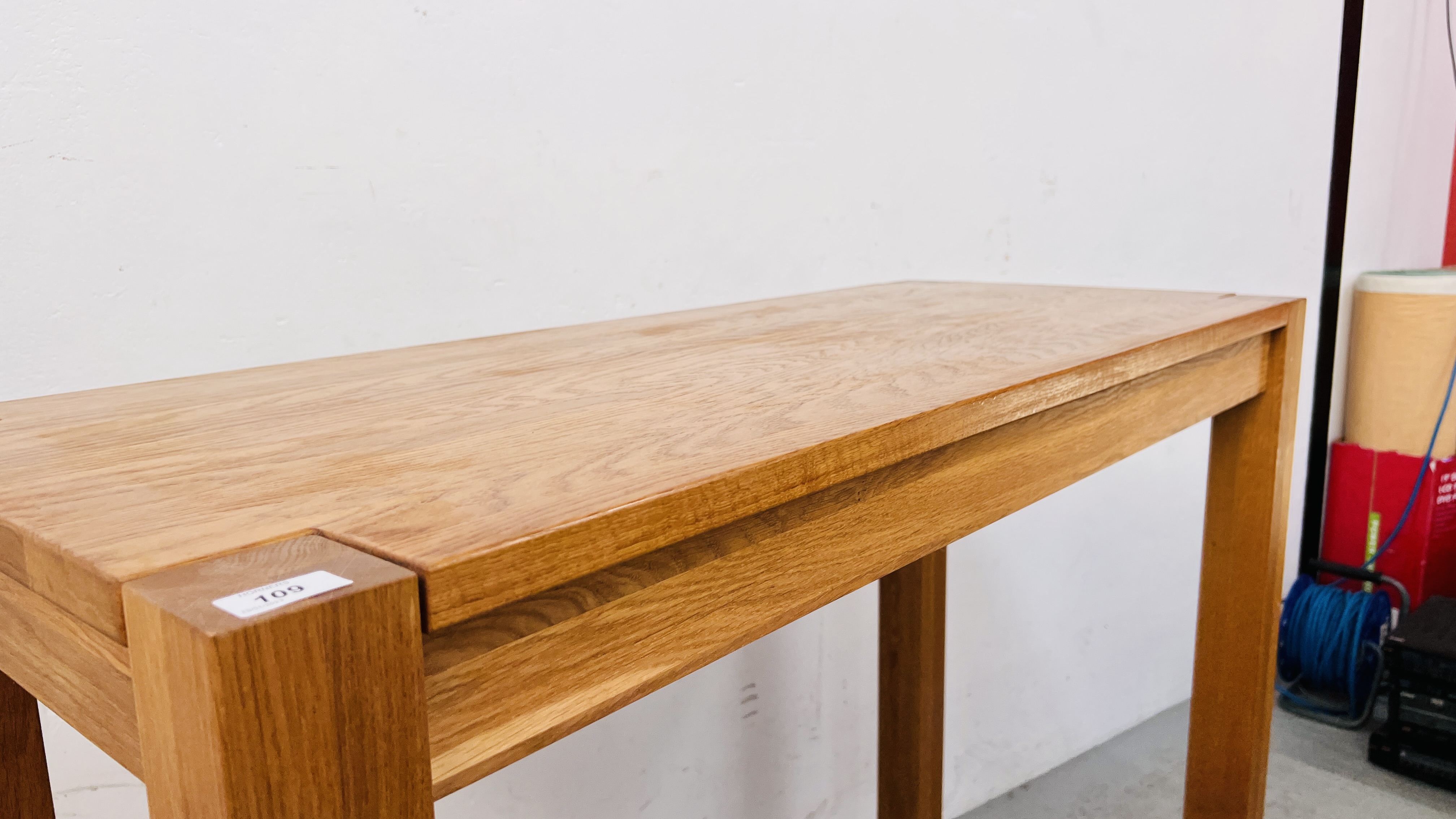 A HEAVY OAK RECTANGULAR BREAKFAST BAR/BAR TABLE ON FOUR SQUARE SUPPORTS WIDTH 120CM. DEPTH 50CM. - Image 9 of 12