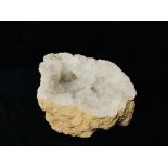 CALCITE CRYSTALS IN A QUARTZ LINED GEODE (IN TWO PARTS), W 20CM X H 19CM X D 13CM.