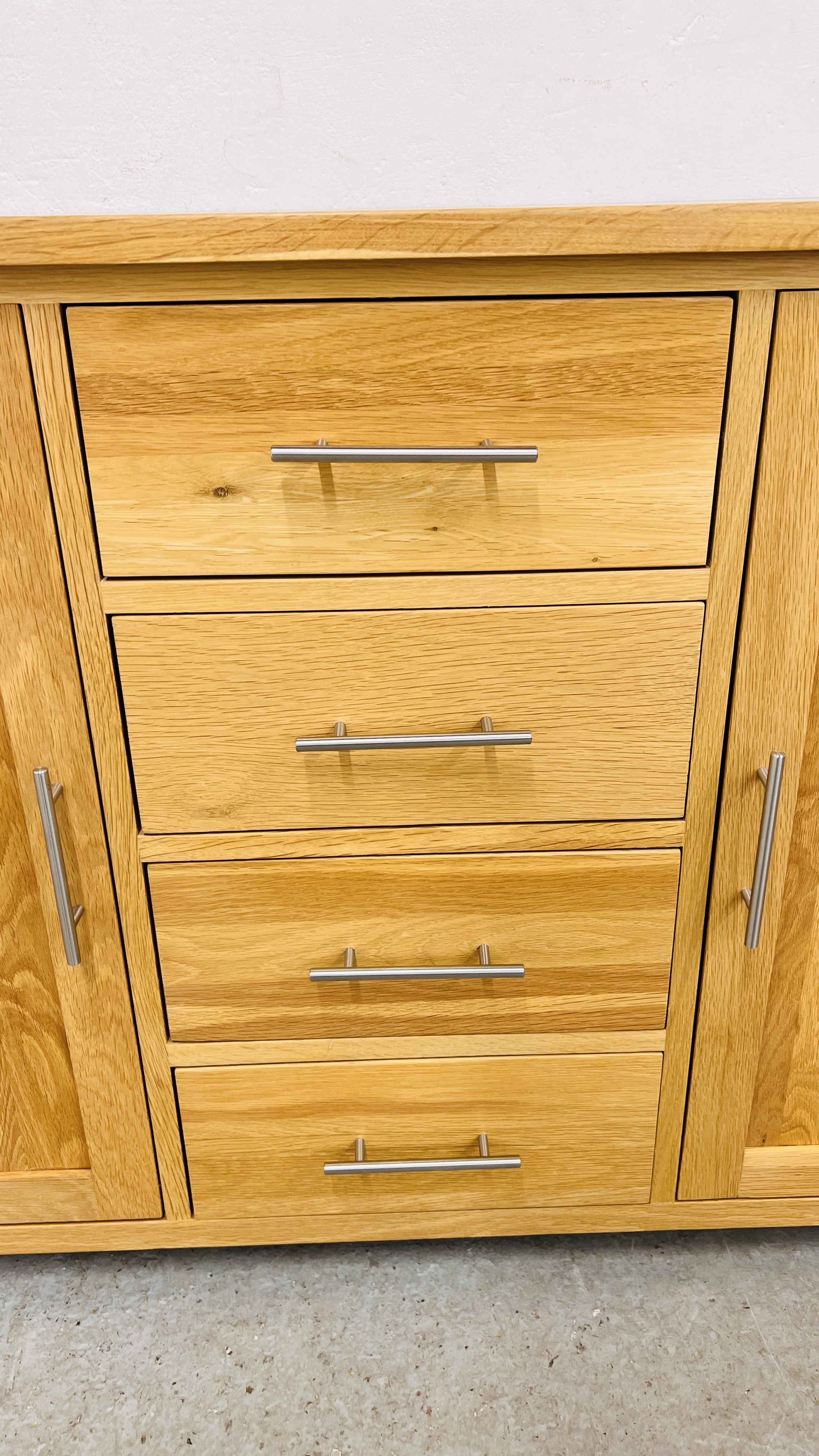 MODERN SOLID LIGHT OAK SIDEBOARD THREE CENTRAL DRAWERS FLANKED BY TWO CUPBOARD DOORS, W 131CM, - Image 5 of 14