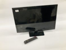 A SAMSUNG 24 INCH TELEVISION COMPLETE WITH REMOTE - SOLD AS SEEN