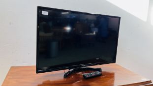 A PANASONIC 32 INCH LED TELEVISION COMPLETE WITH REMOTE CONTROL - SOLD AS SEEN